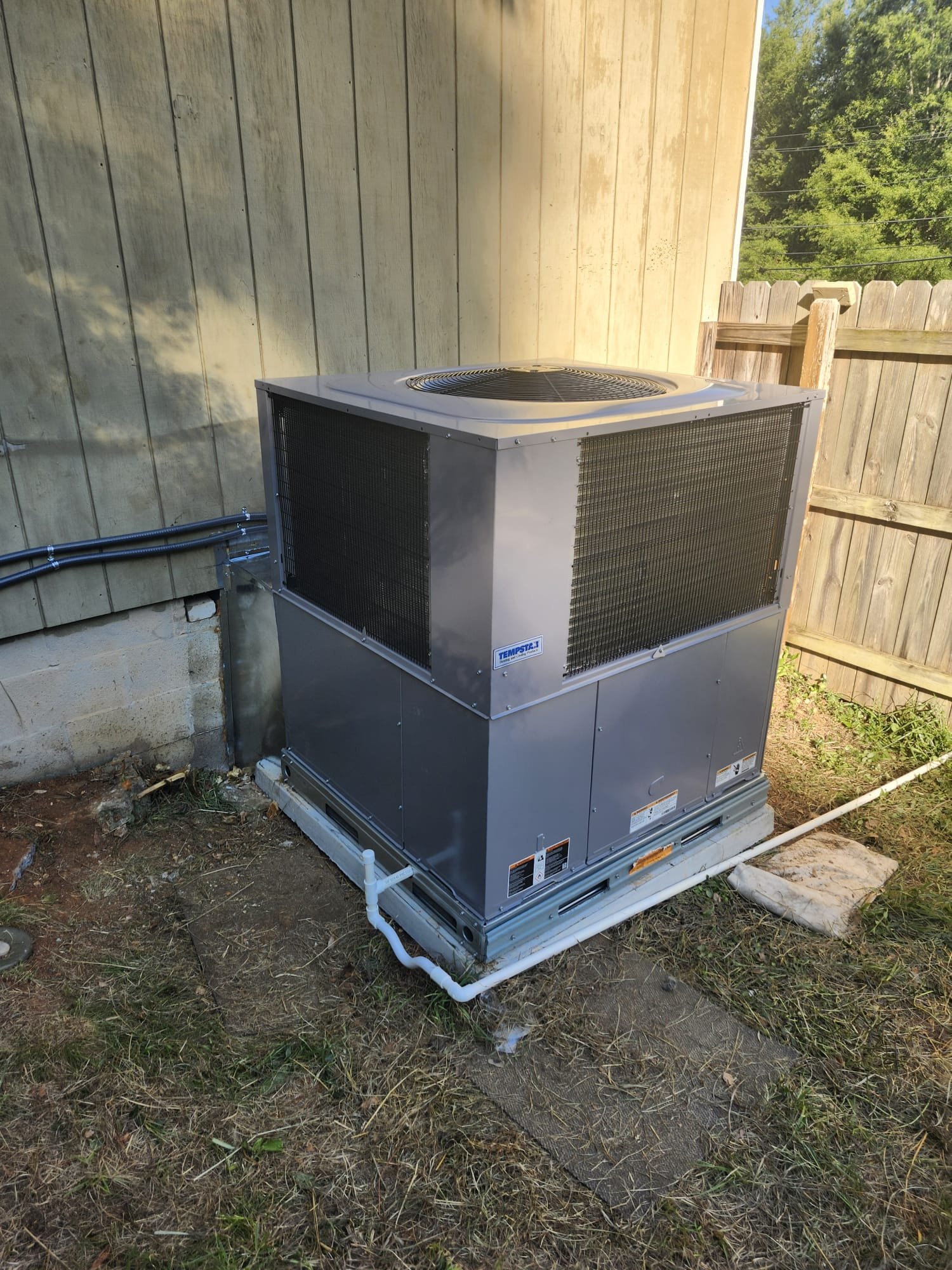 Outdoor HVAC unit with organized connections