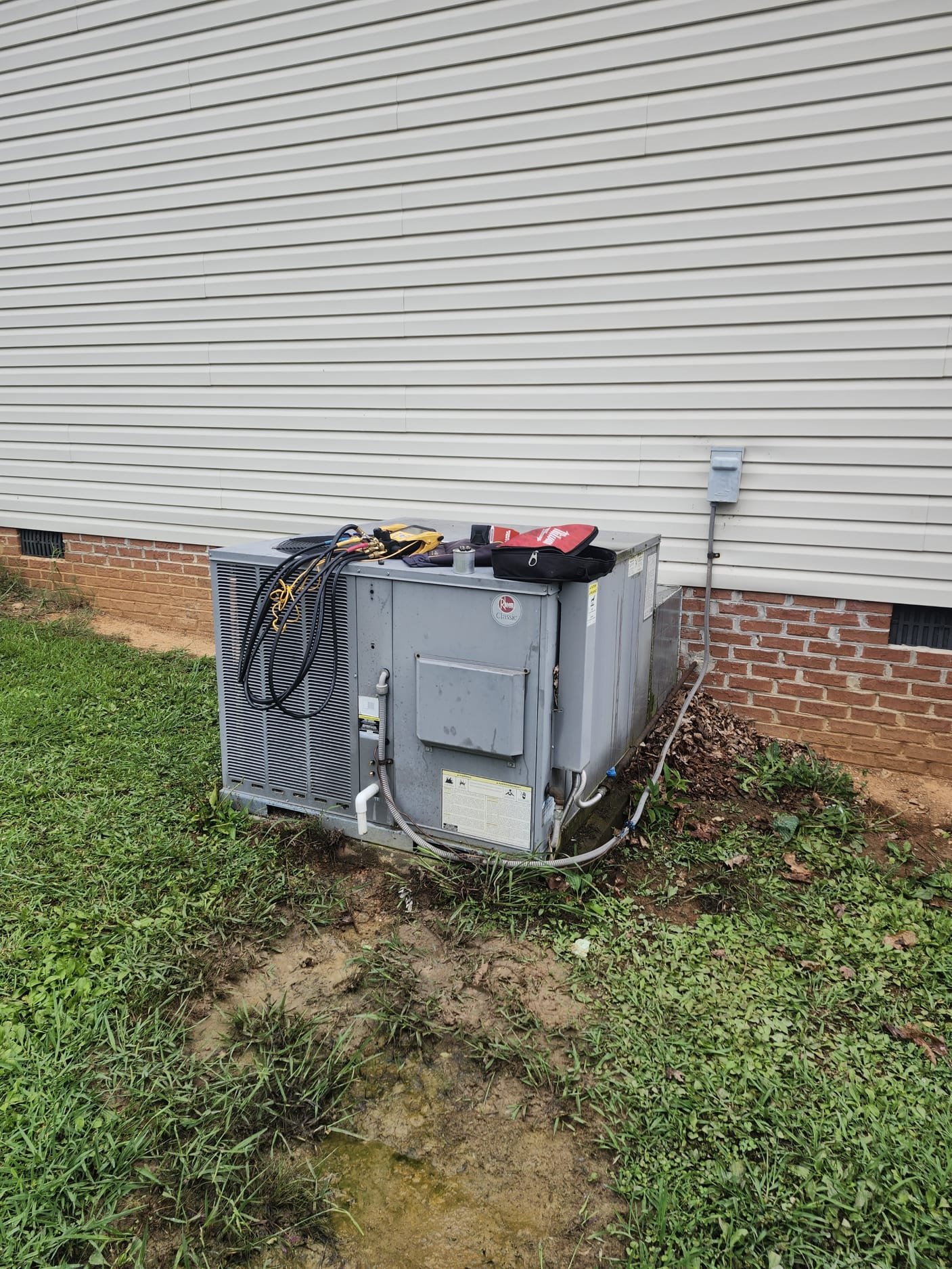 Outdoor HVAC Maintenance in Progress