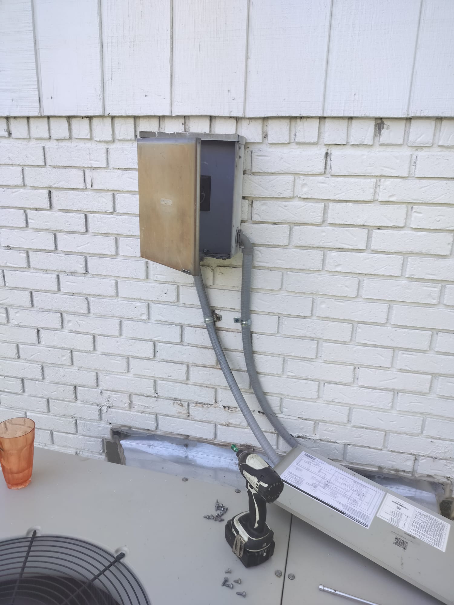 Outdoor HVAC unit during service