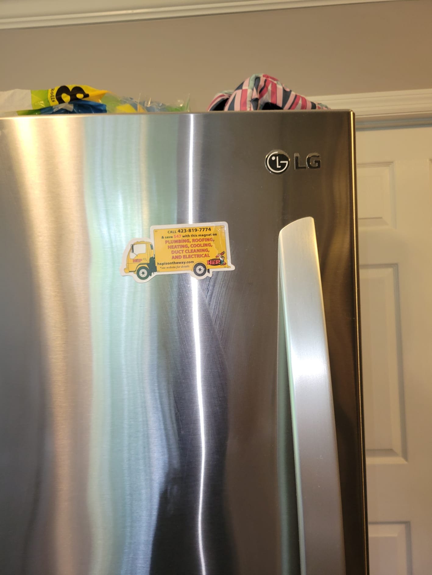 Service magnet on refrigerator