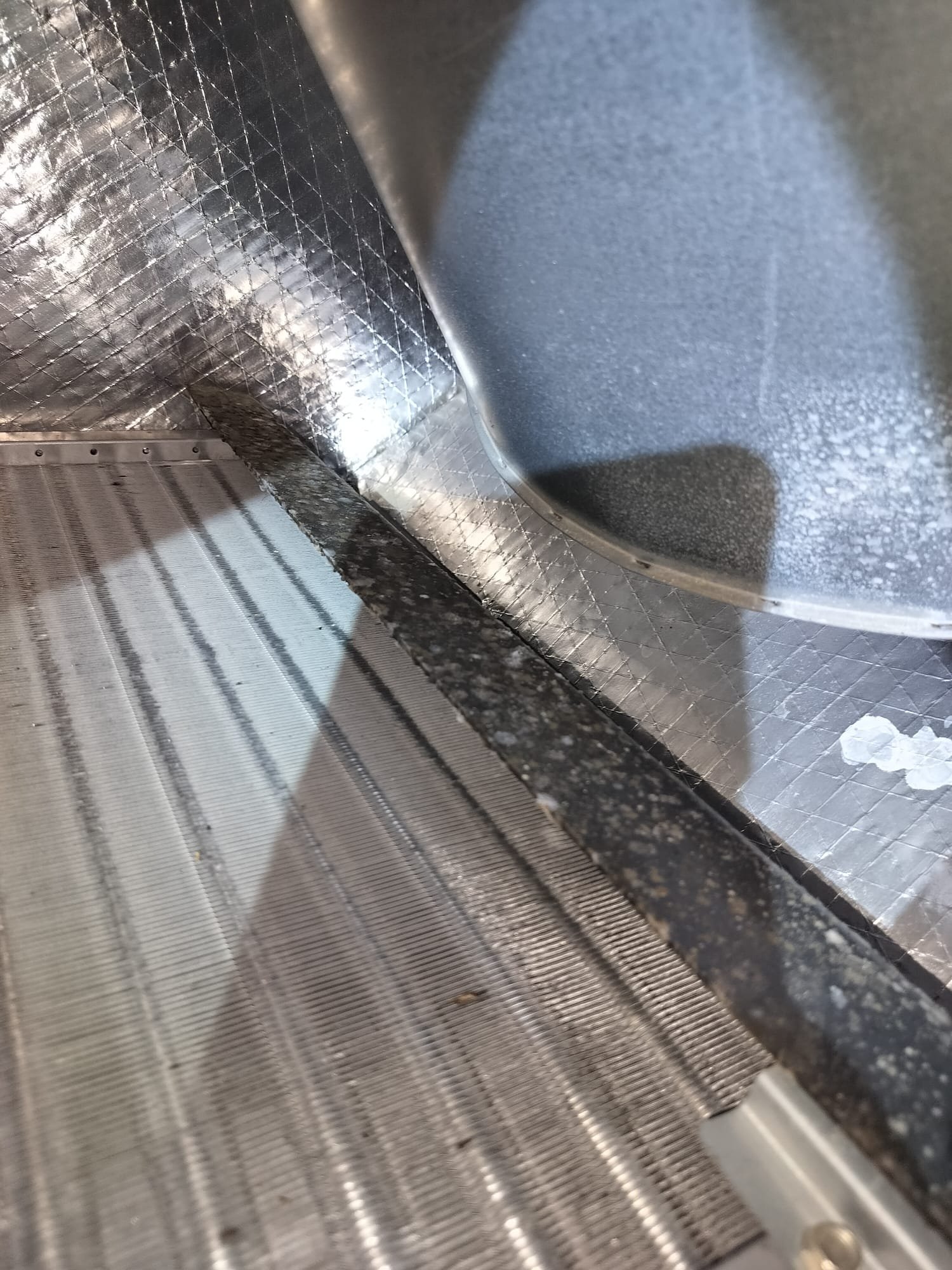 Clean HVAC ductwork with minimal dust and bright metal surfaces