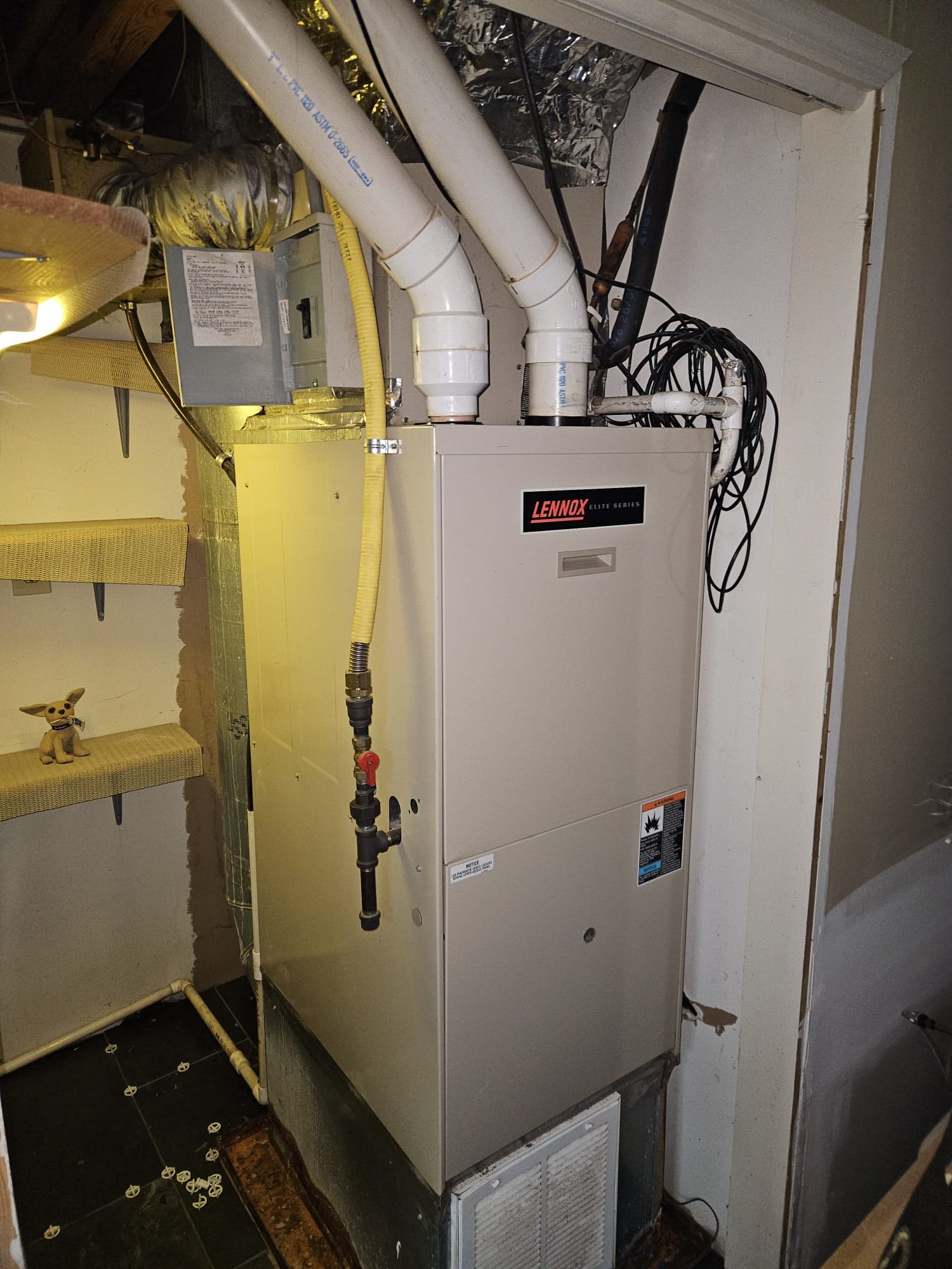 New Lennox Elite Series furnace installed in a neat utility closet.