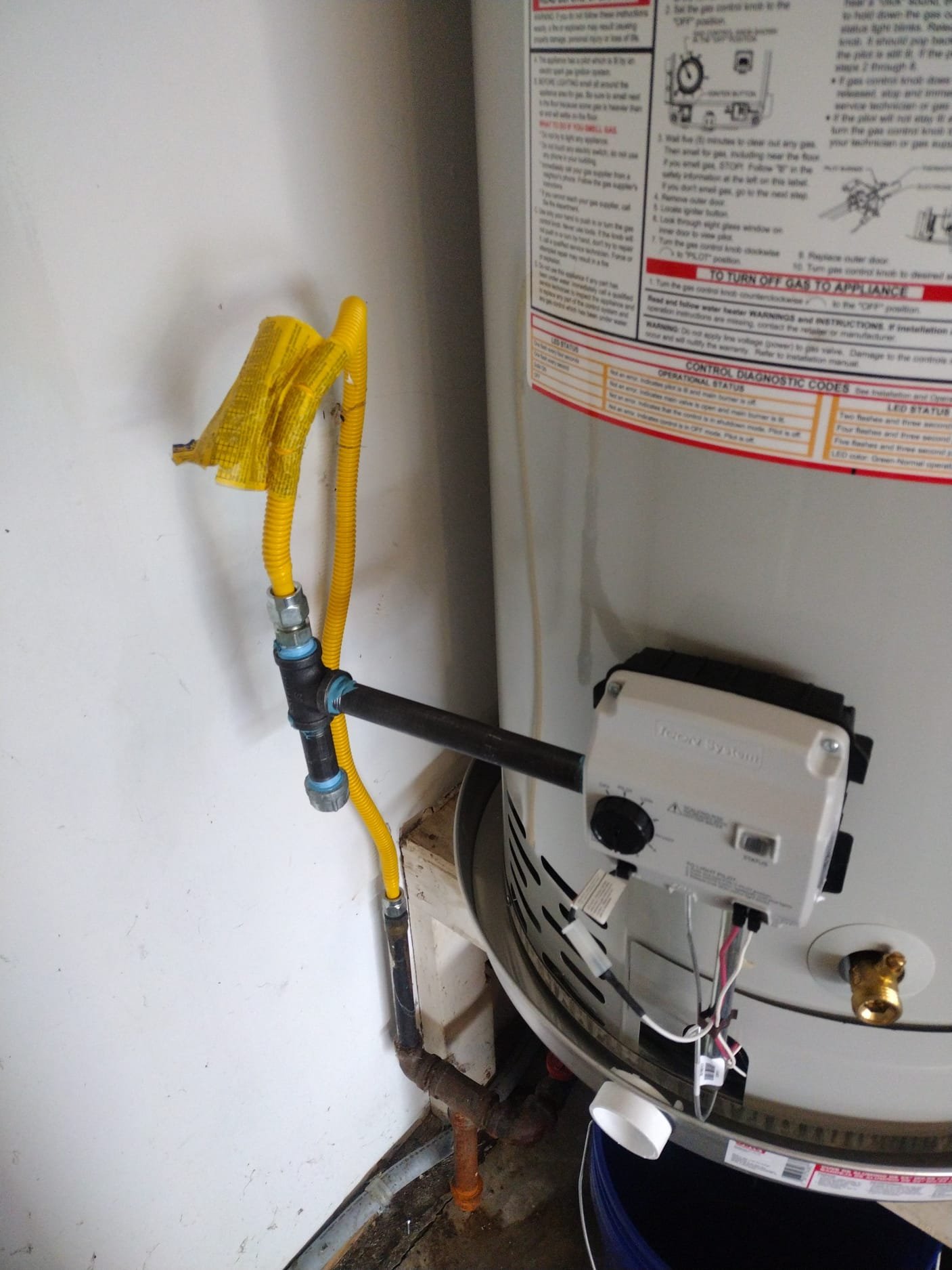 Close-Up of Gas Line and Control Assembly