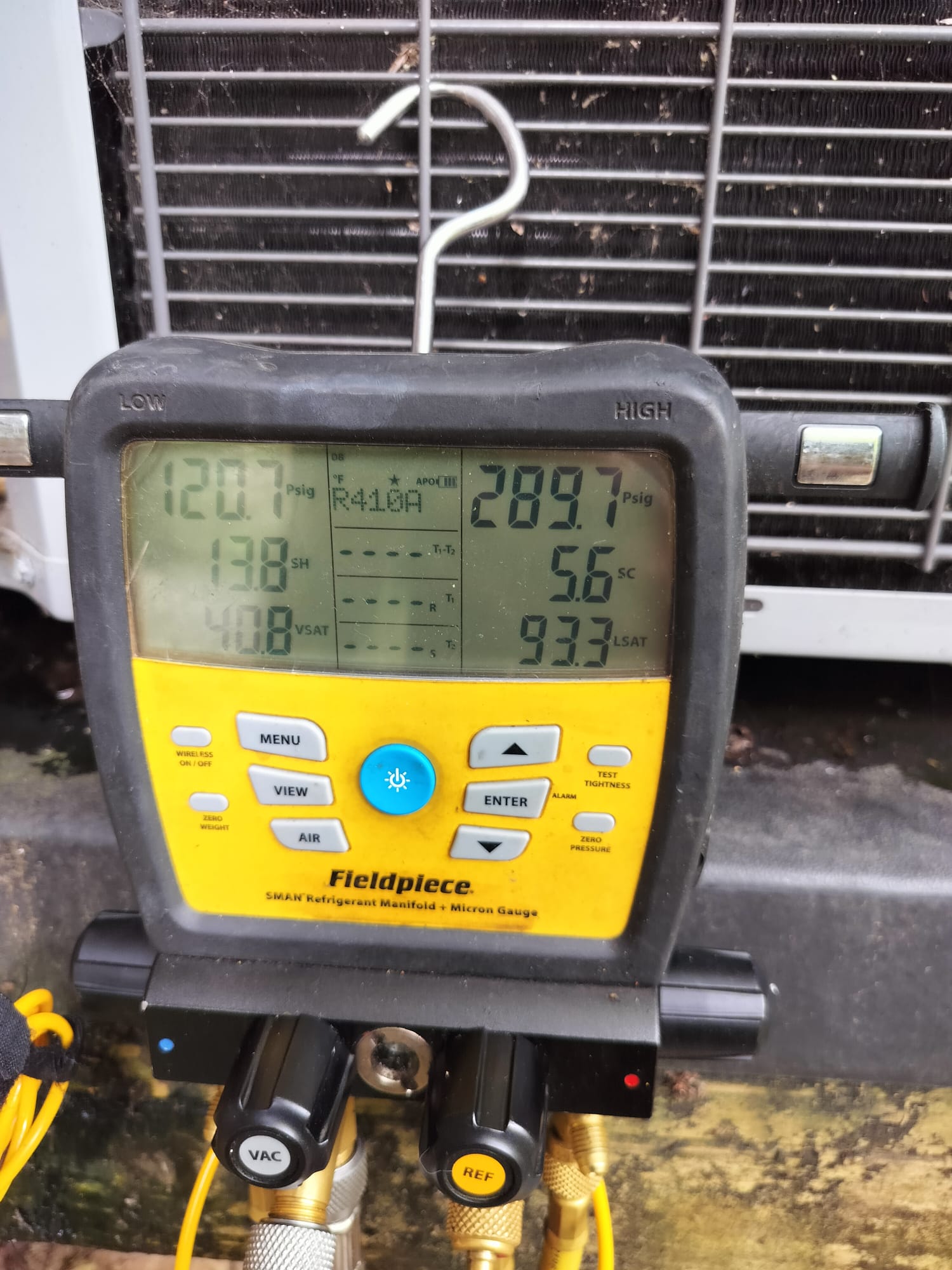 Digital refrigerant manifold gauge in use