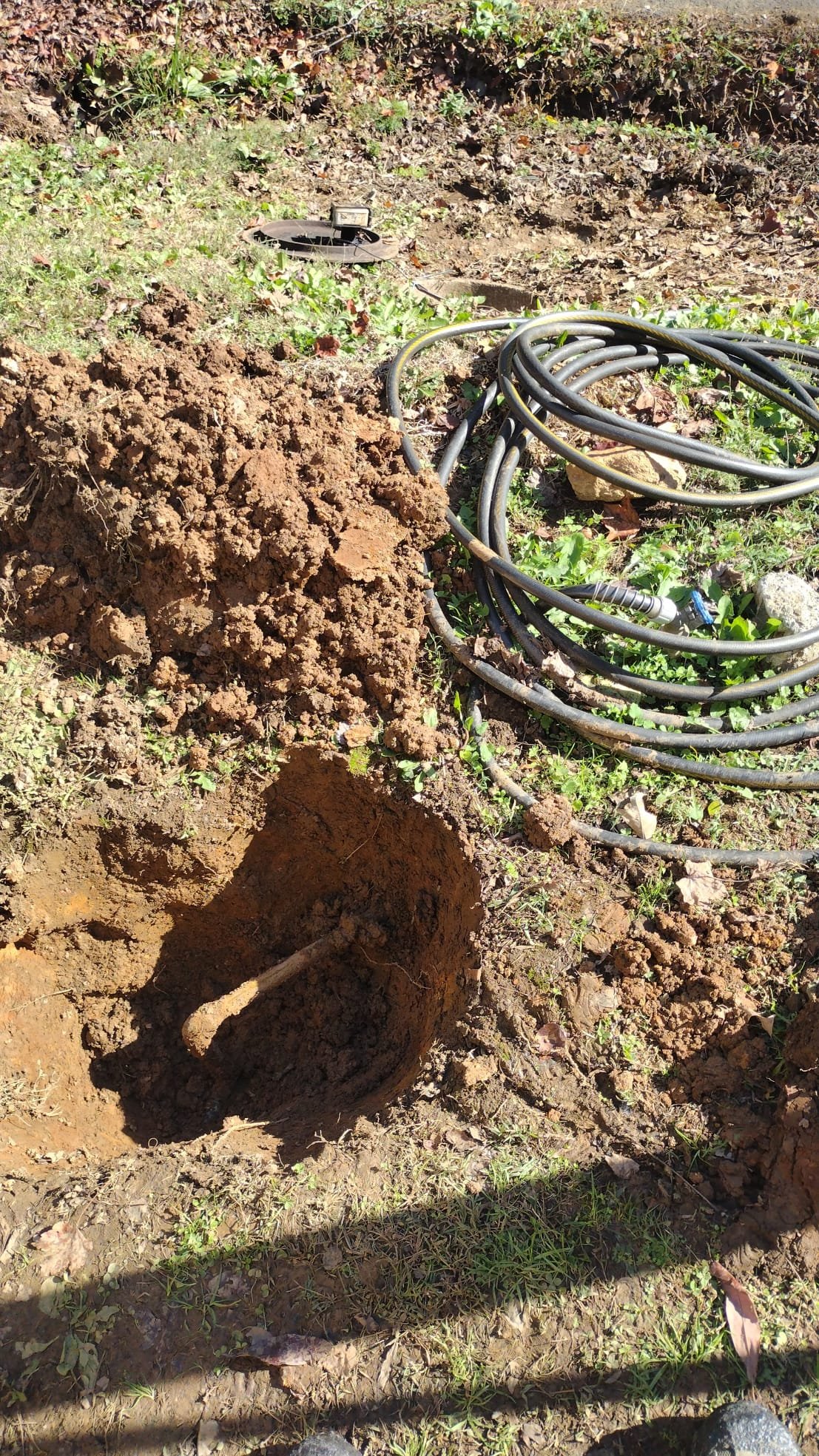 Coiled new water line ready for installation