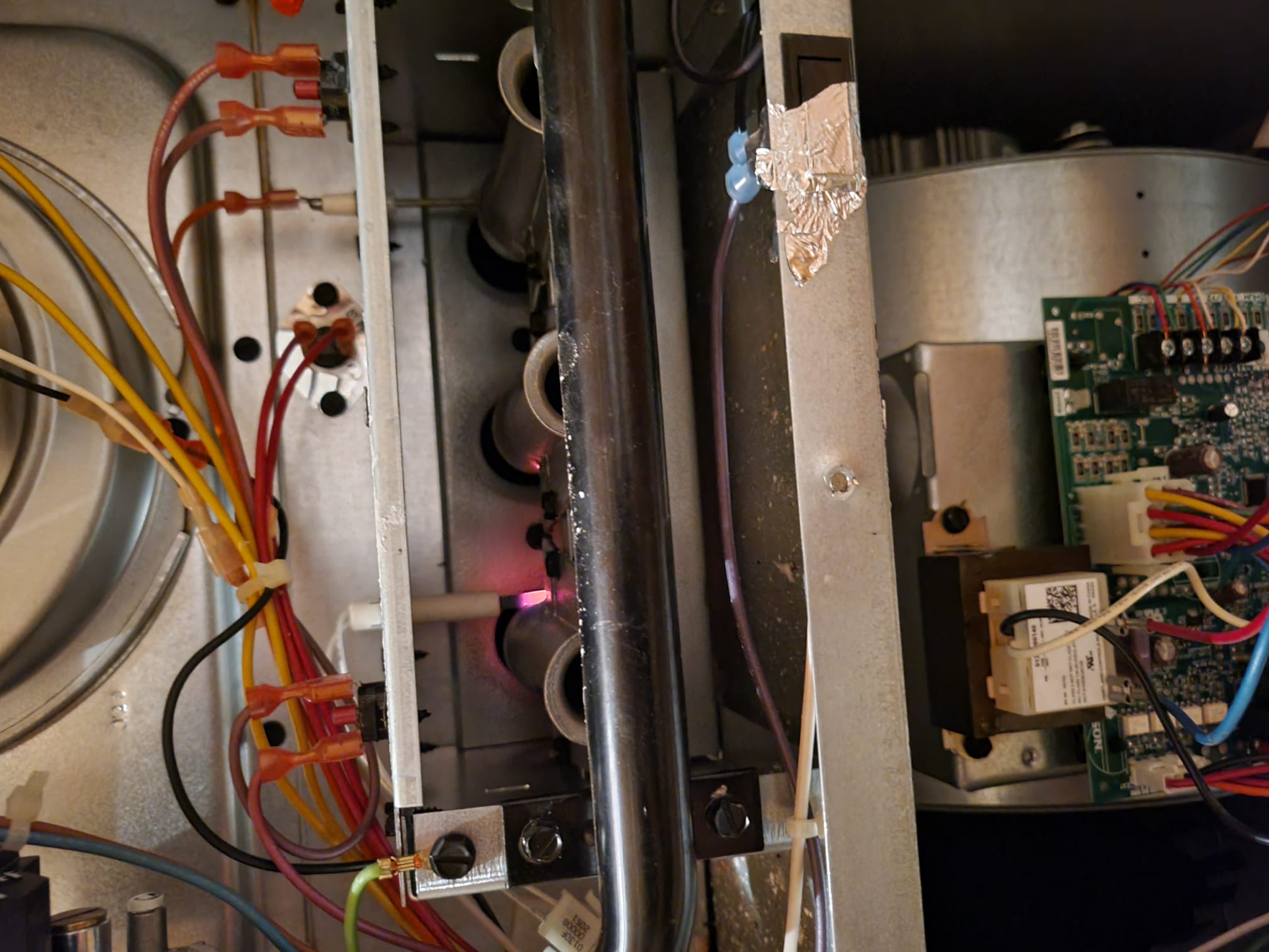 Burner assembly igniting inside a furnace