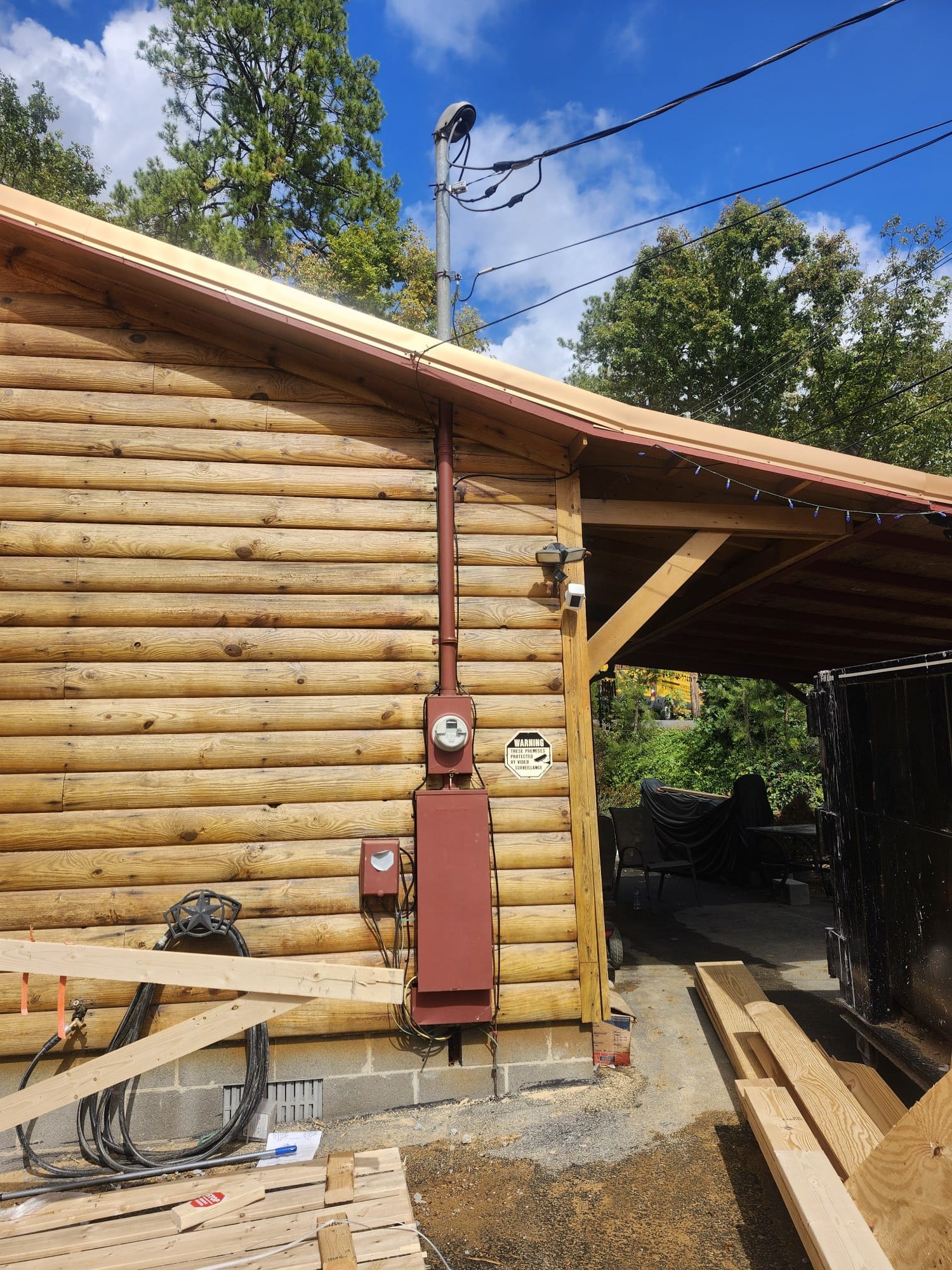 New Main Service Panel installed on a cabin exterior