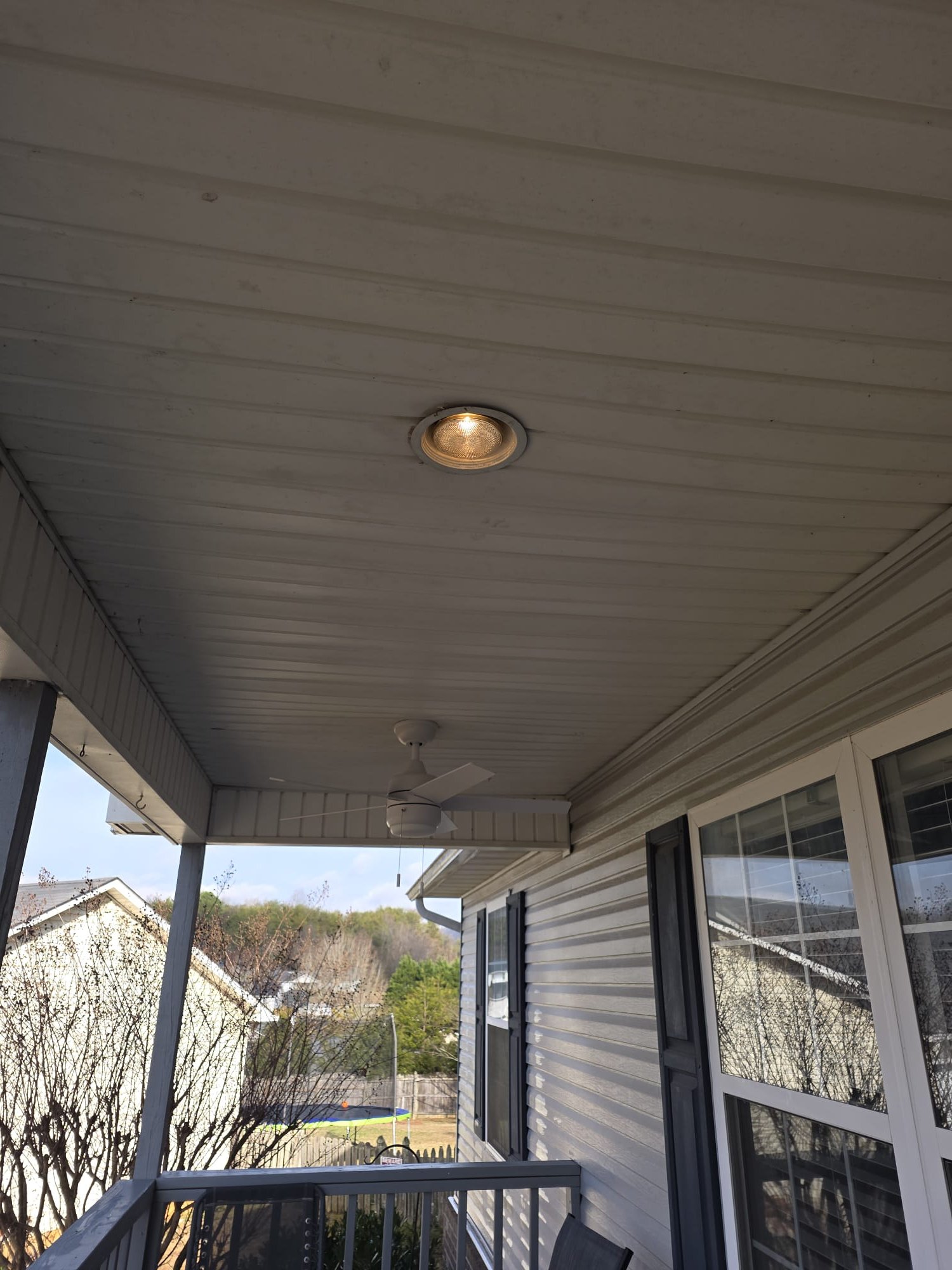 Recessed light and new ceiling fan on porch
