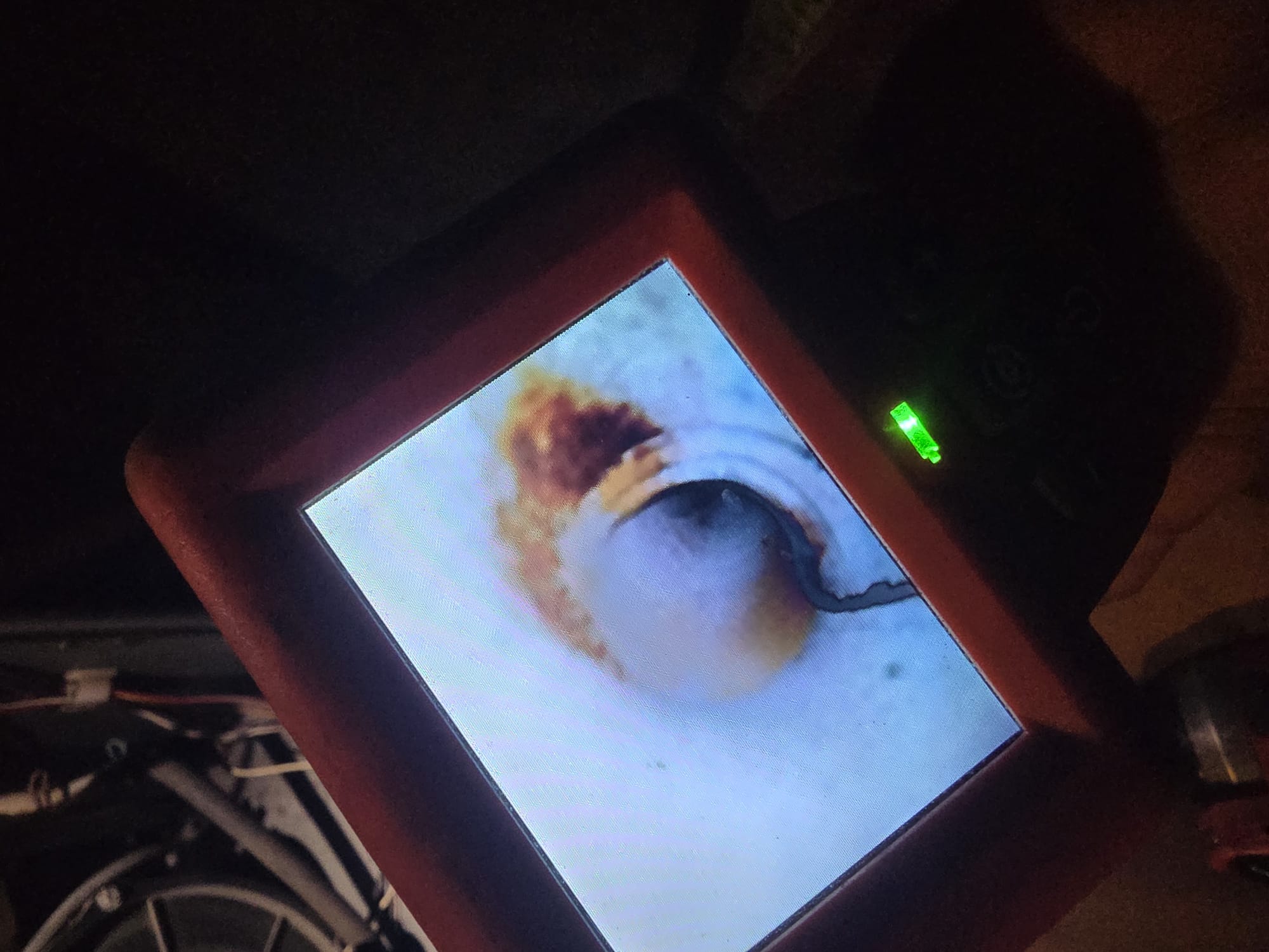 Inspection camera revealing internal corrosion