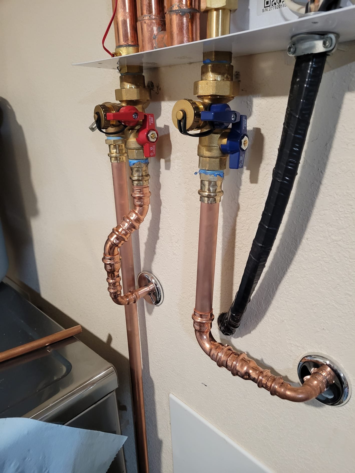 Fresh copper pipes with brass valves