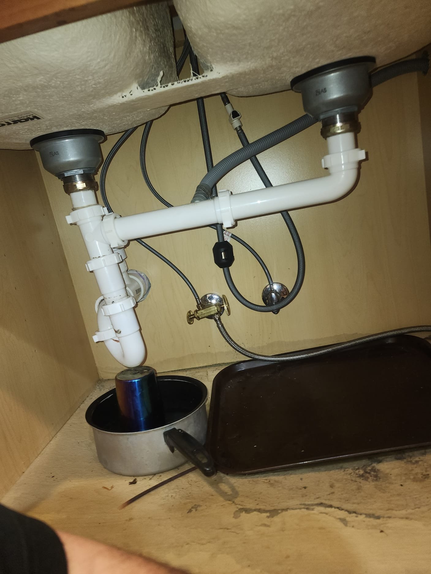 Under-Sink Plumbing with New PVC Pipes