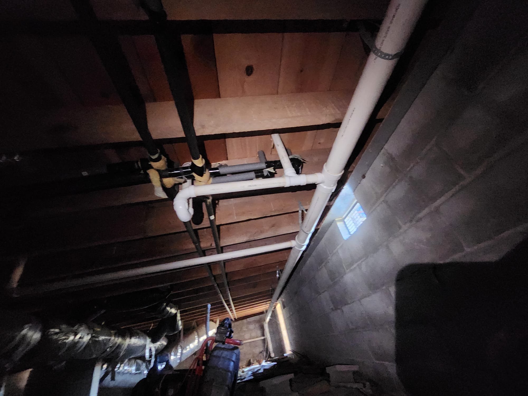 Underfloor View of Completed PVC Installation