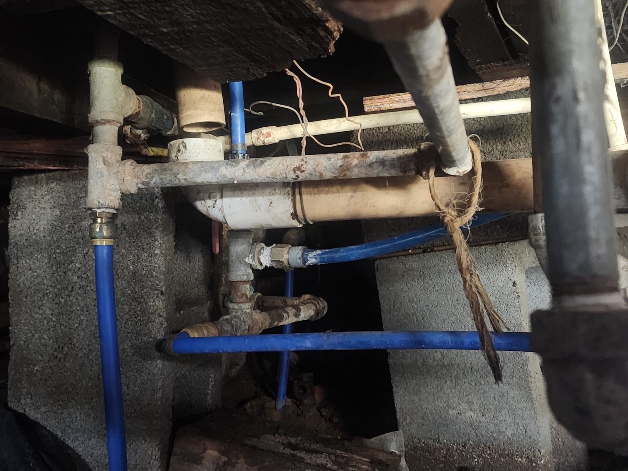 New PEX piping installed next to older lines.