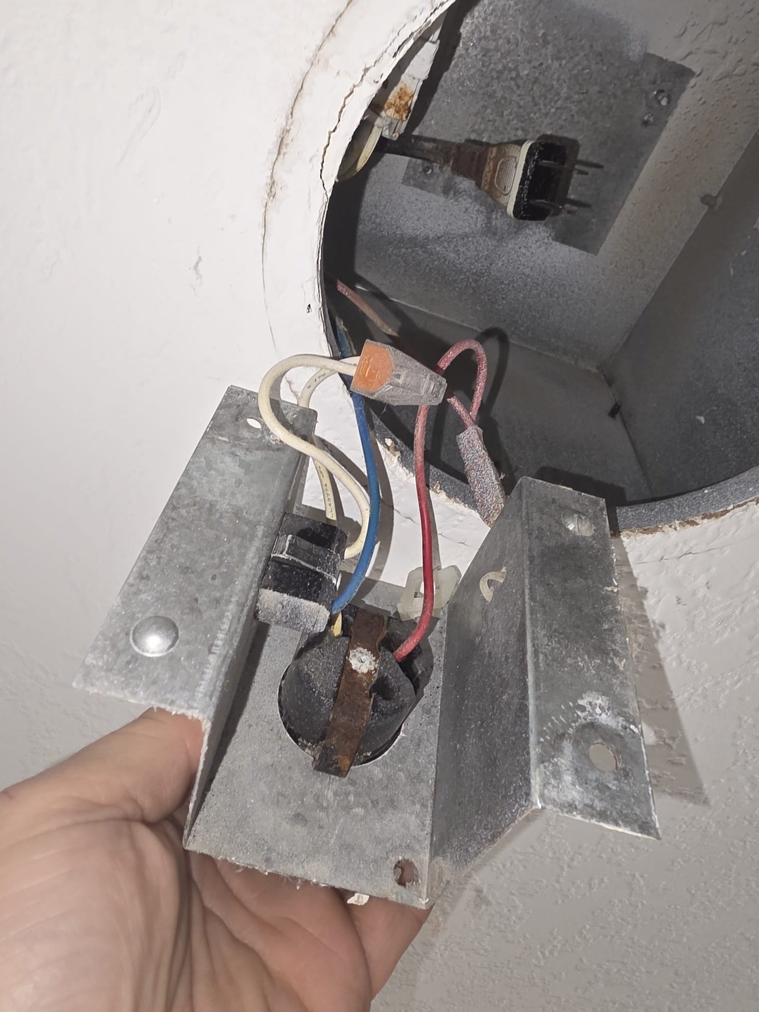 Electrical junction box removed for inspection