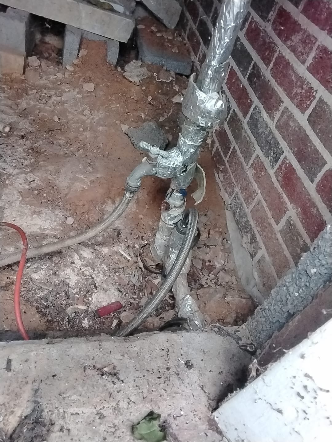 Outdoor plumbing lines with insulation in need of upgrade