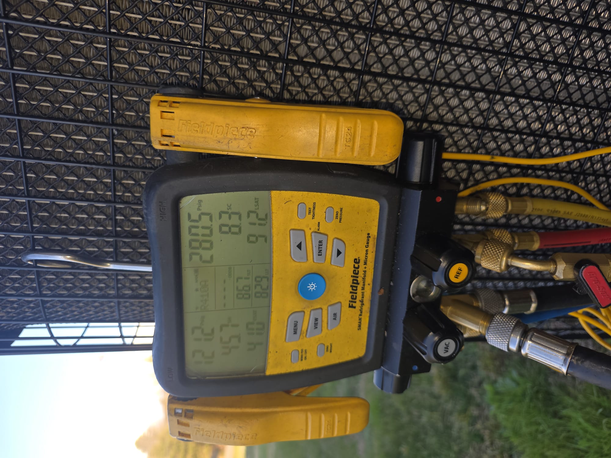 Using a digital manifold gauge set during diagnostics helps confirm proper refrigerant levels.