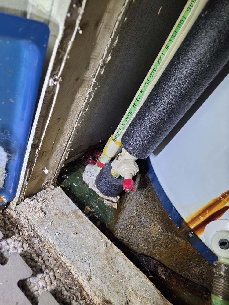 Freshly installed PVC and insulated water lines with shutoff valves