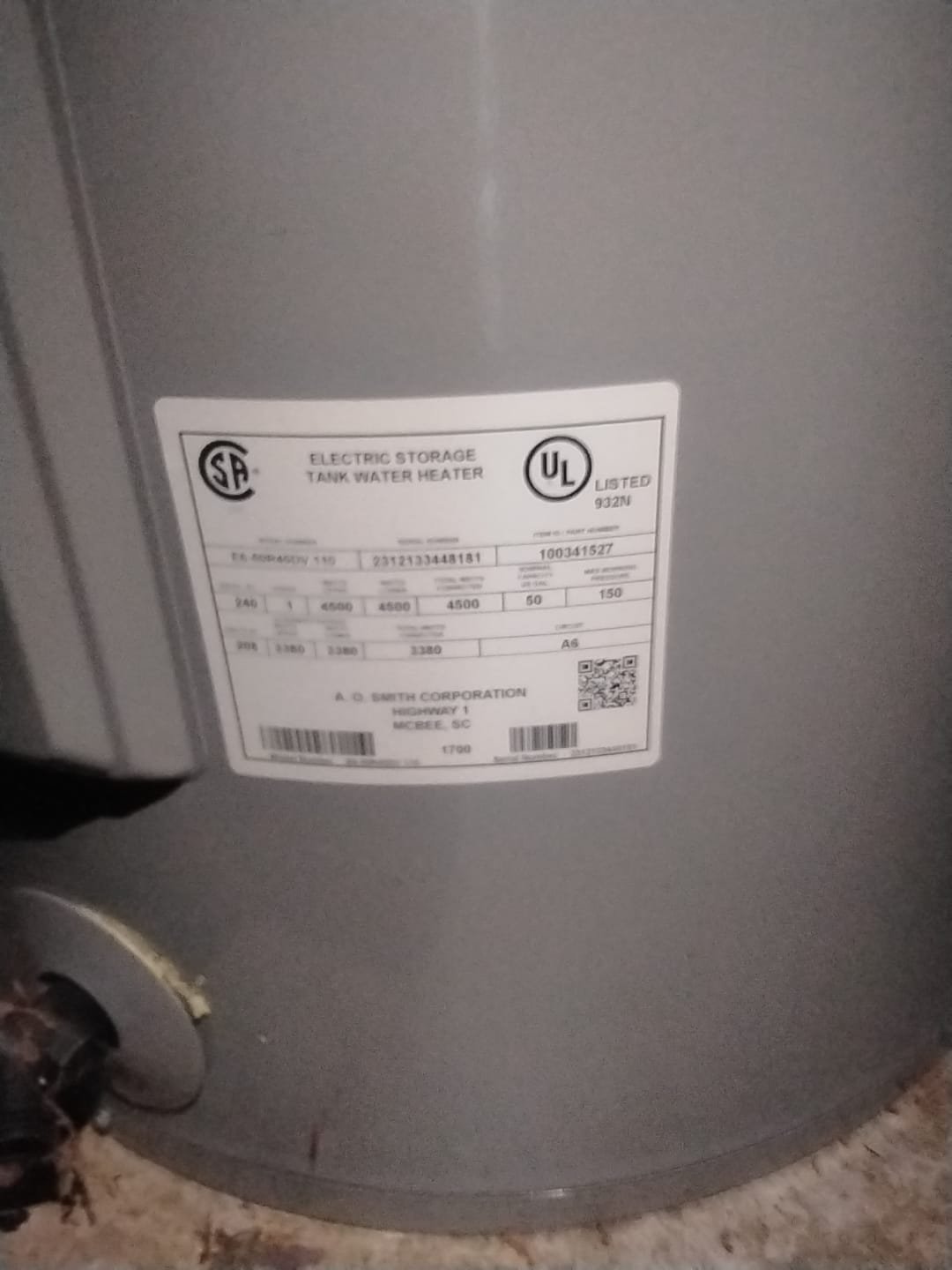 A new electric storage water heater and piping installed by a professional