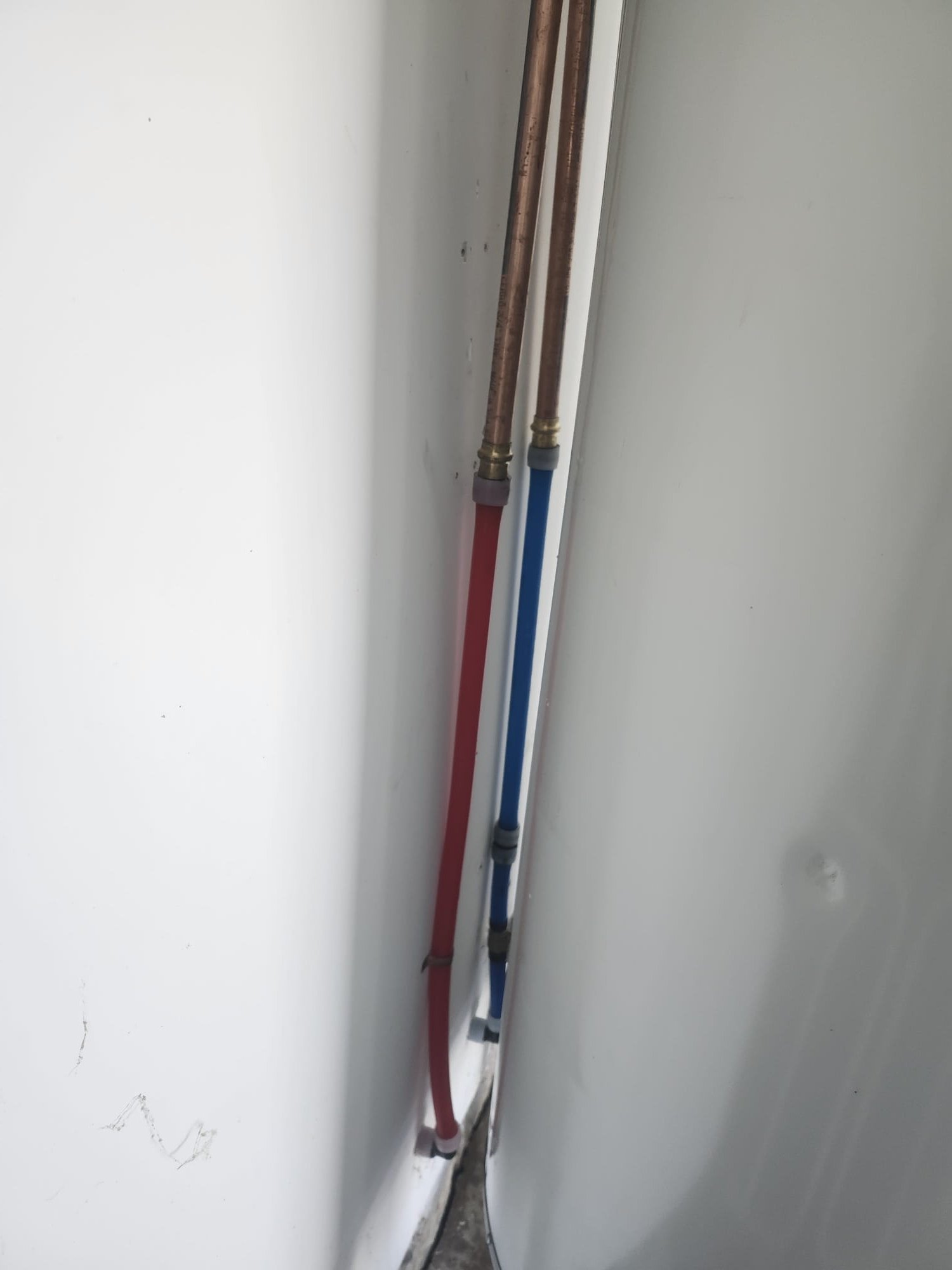 Color-coded hot and cold PEX water lines