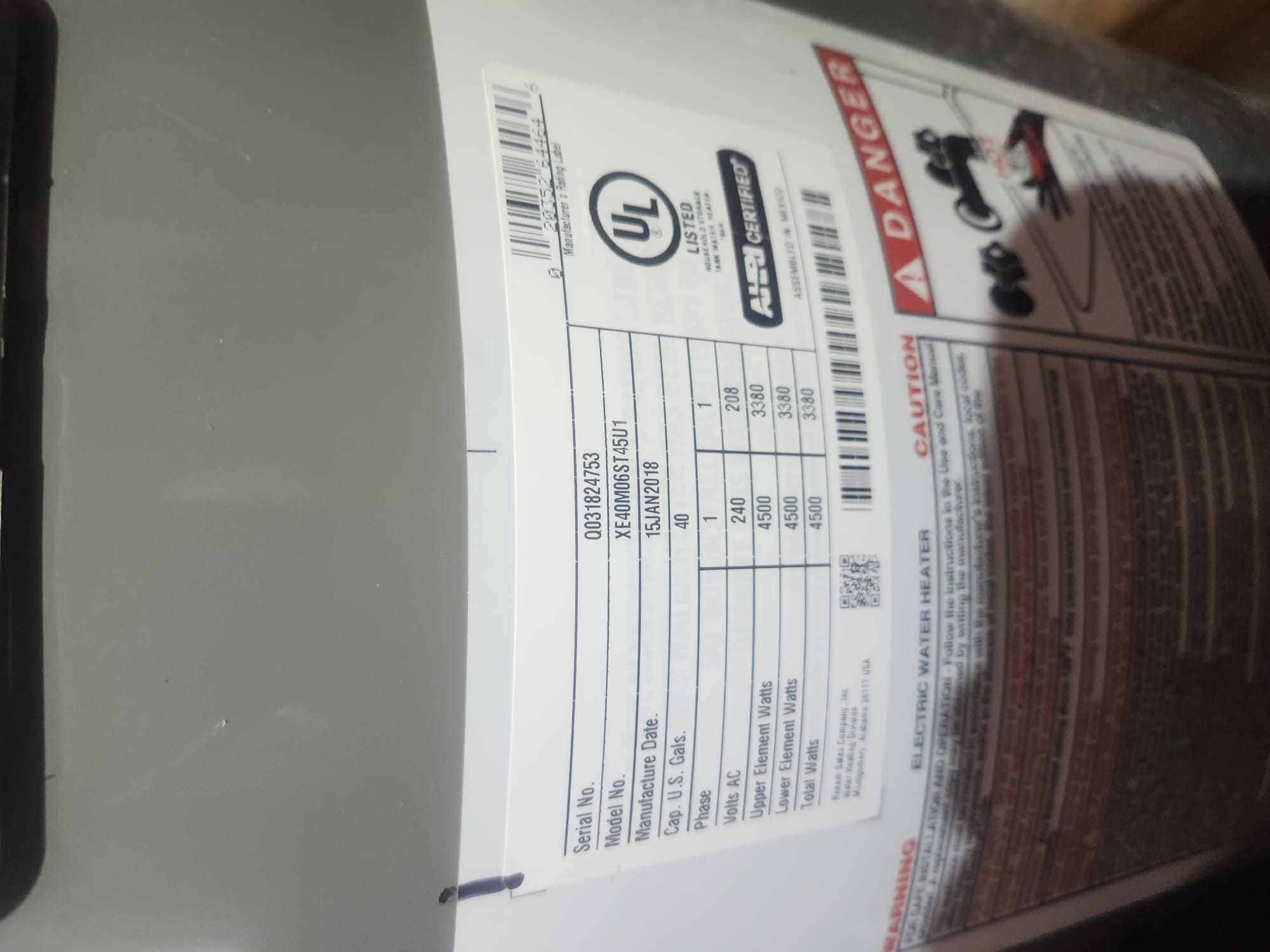 Manufacturer’s label on an electric water heater
