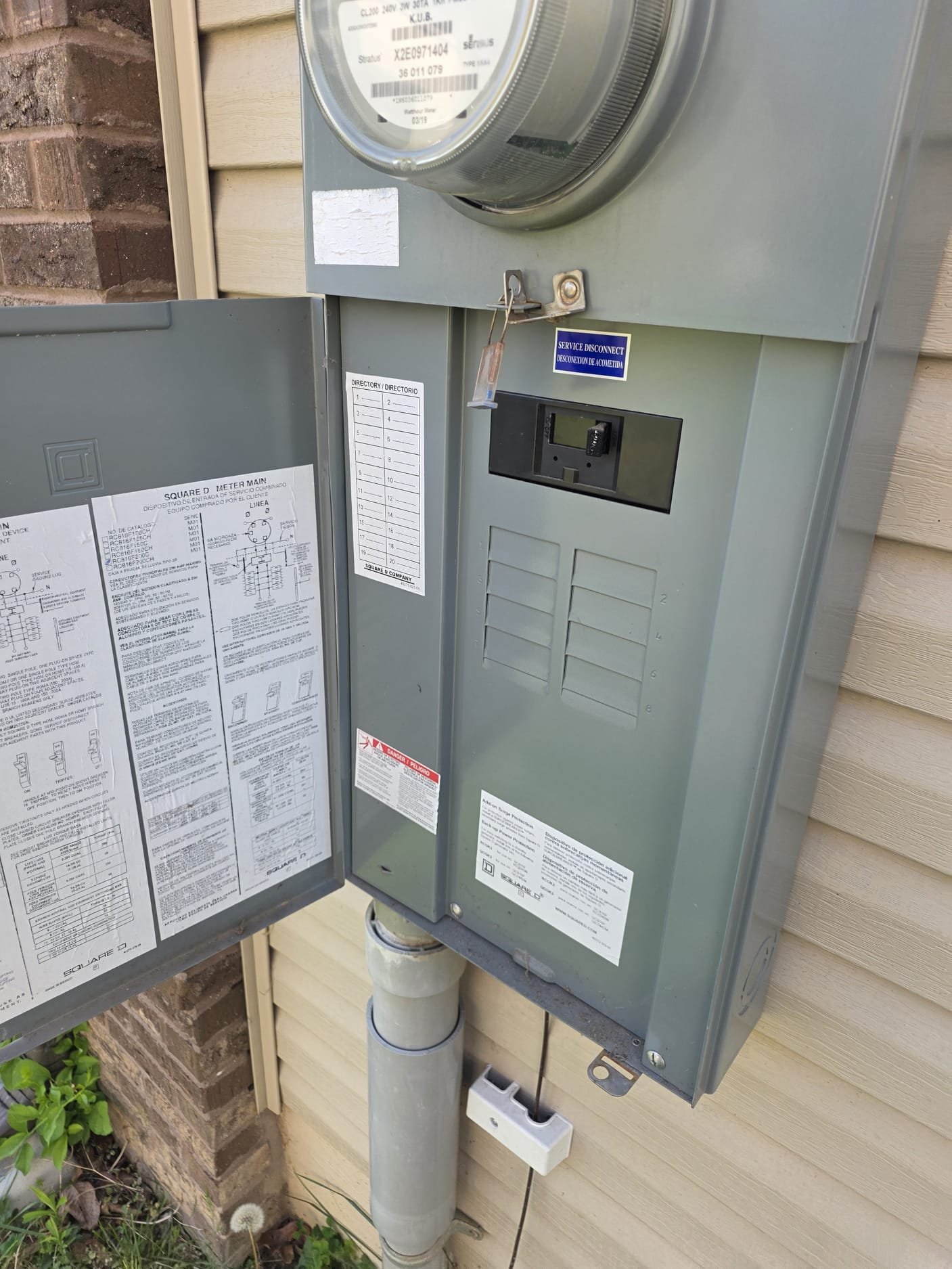 Outdoor electrical service panel with meter and disconnect.
