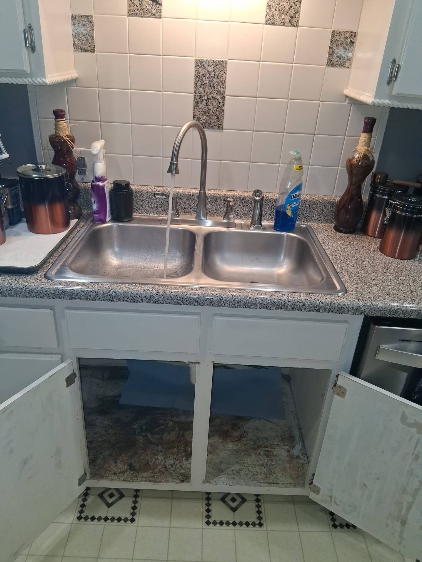 Updated Kitchen Faucet and Cabinet