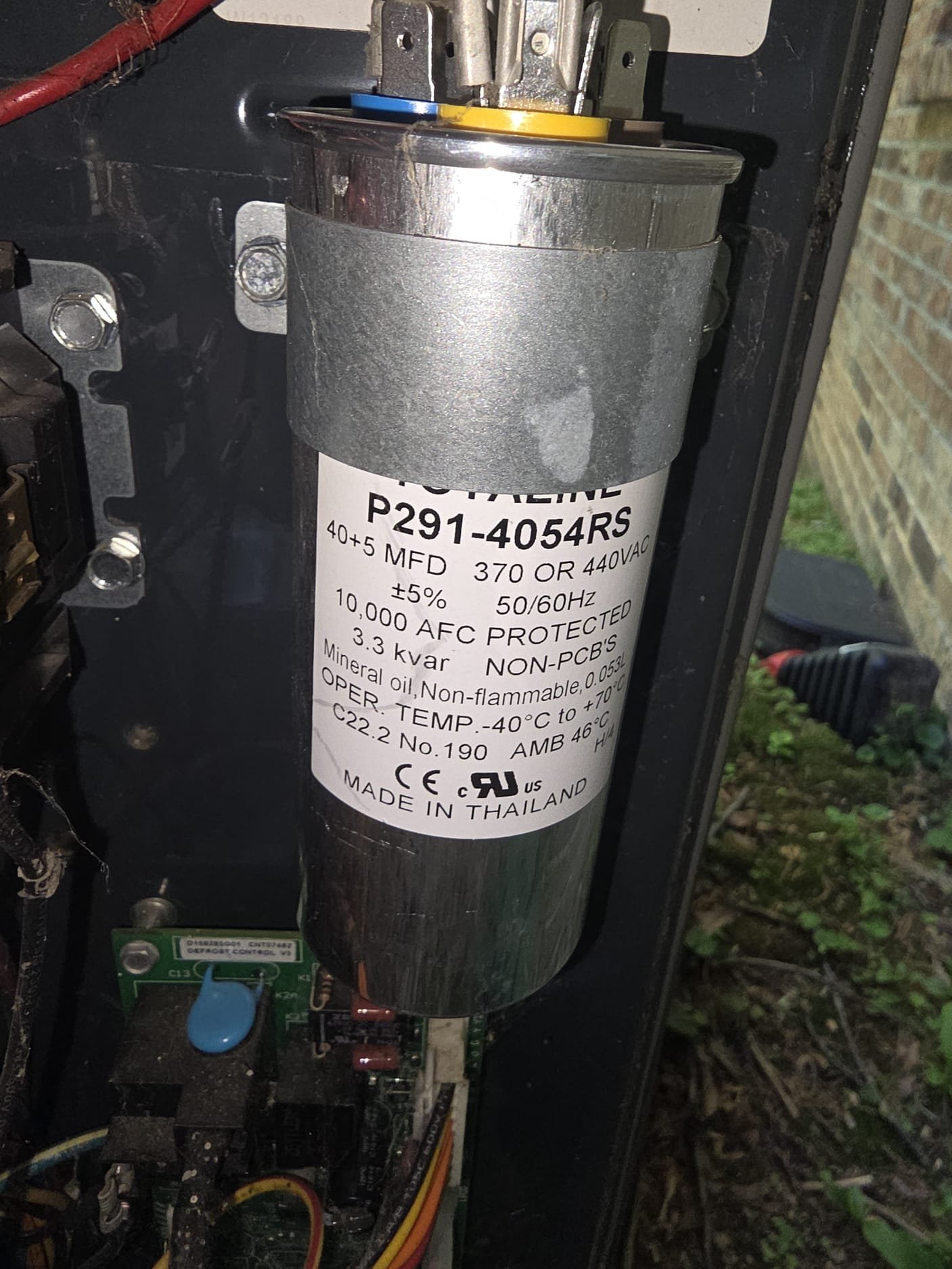 Newly installed dual run capacitor