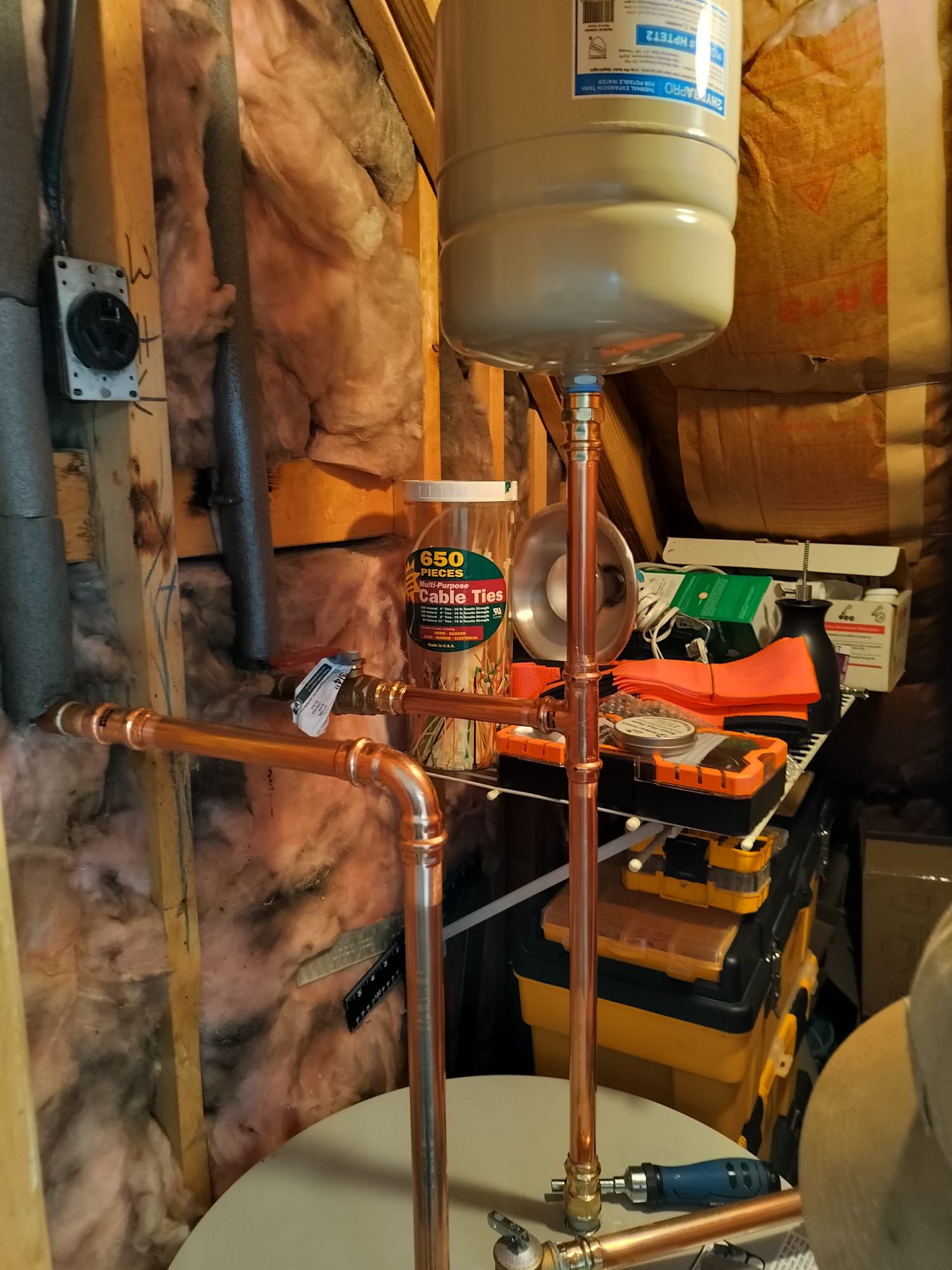 New copper piping and expansion tank after professional plumbing install