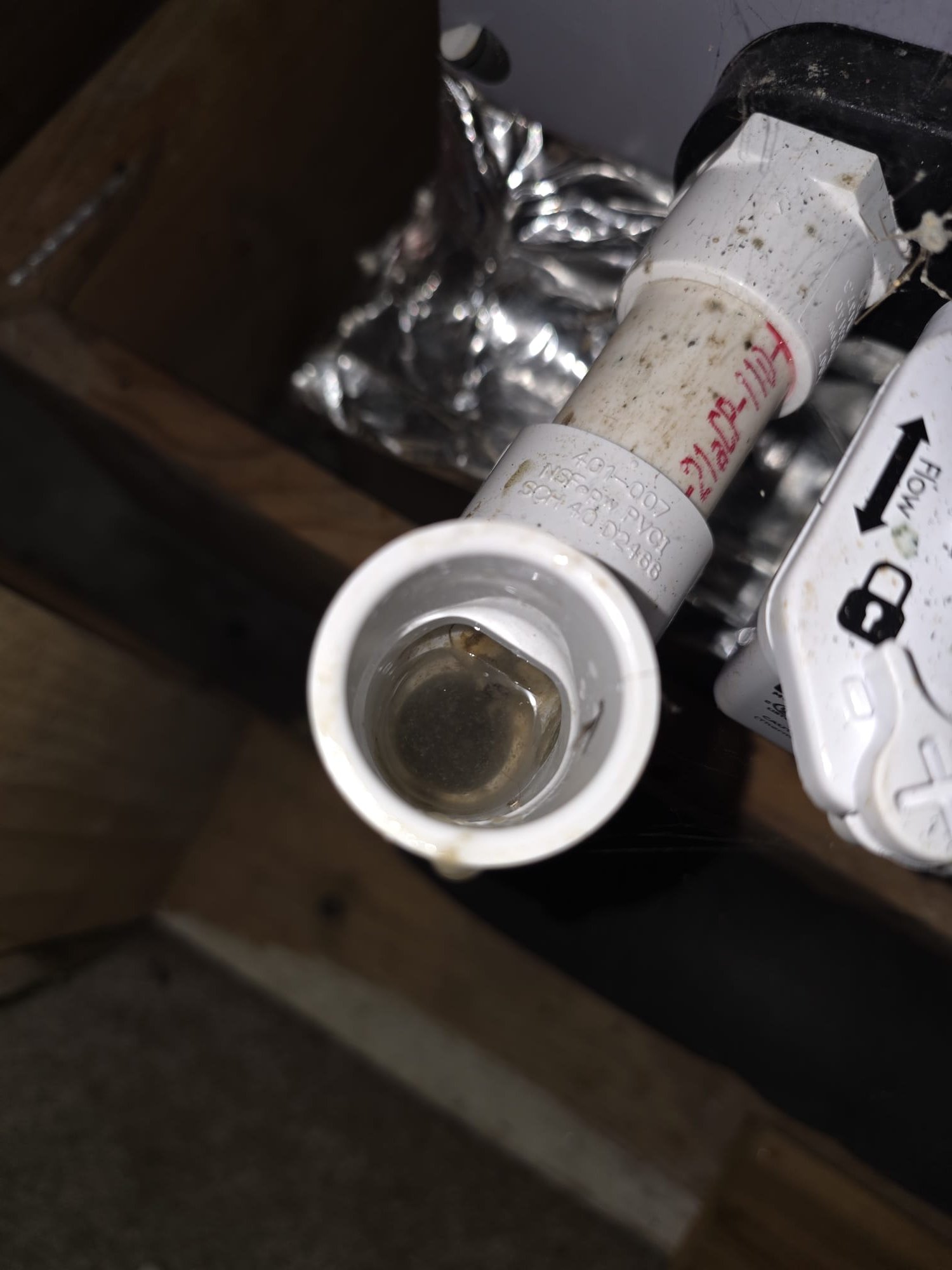 Condensate drain cleanout port before cleaning