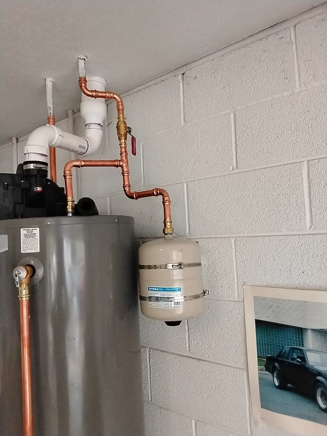 Installed water heater with expansion tank and new copper piping