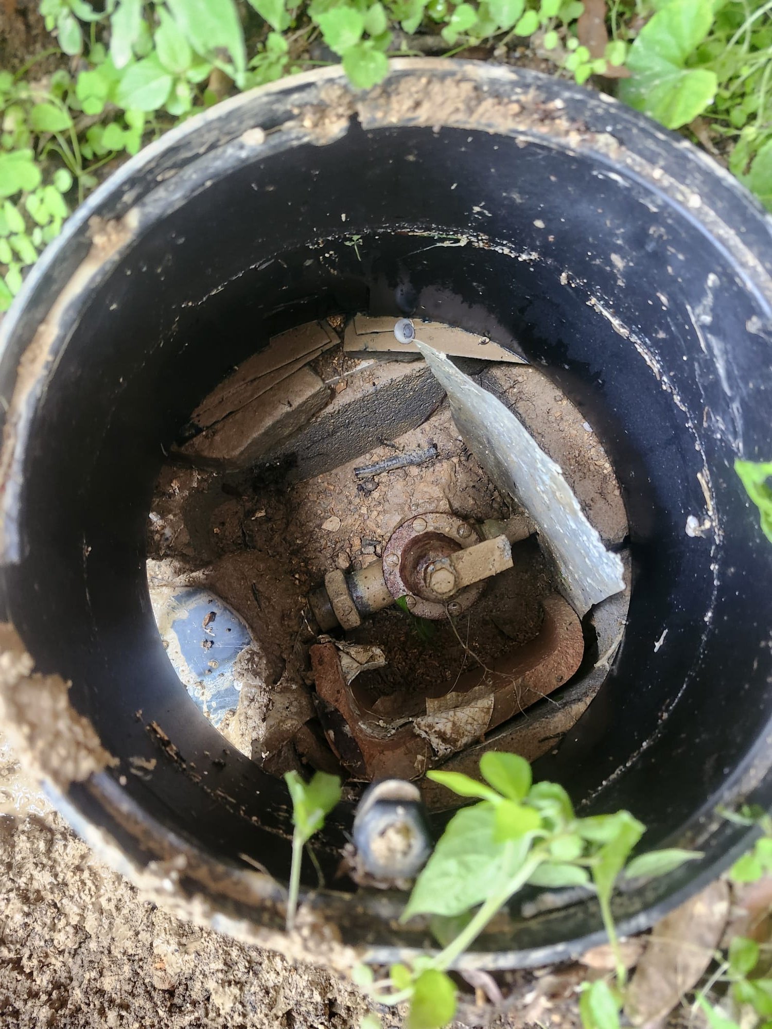 Corroded underground valve box before servicing.