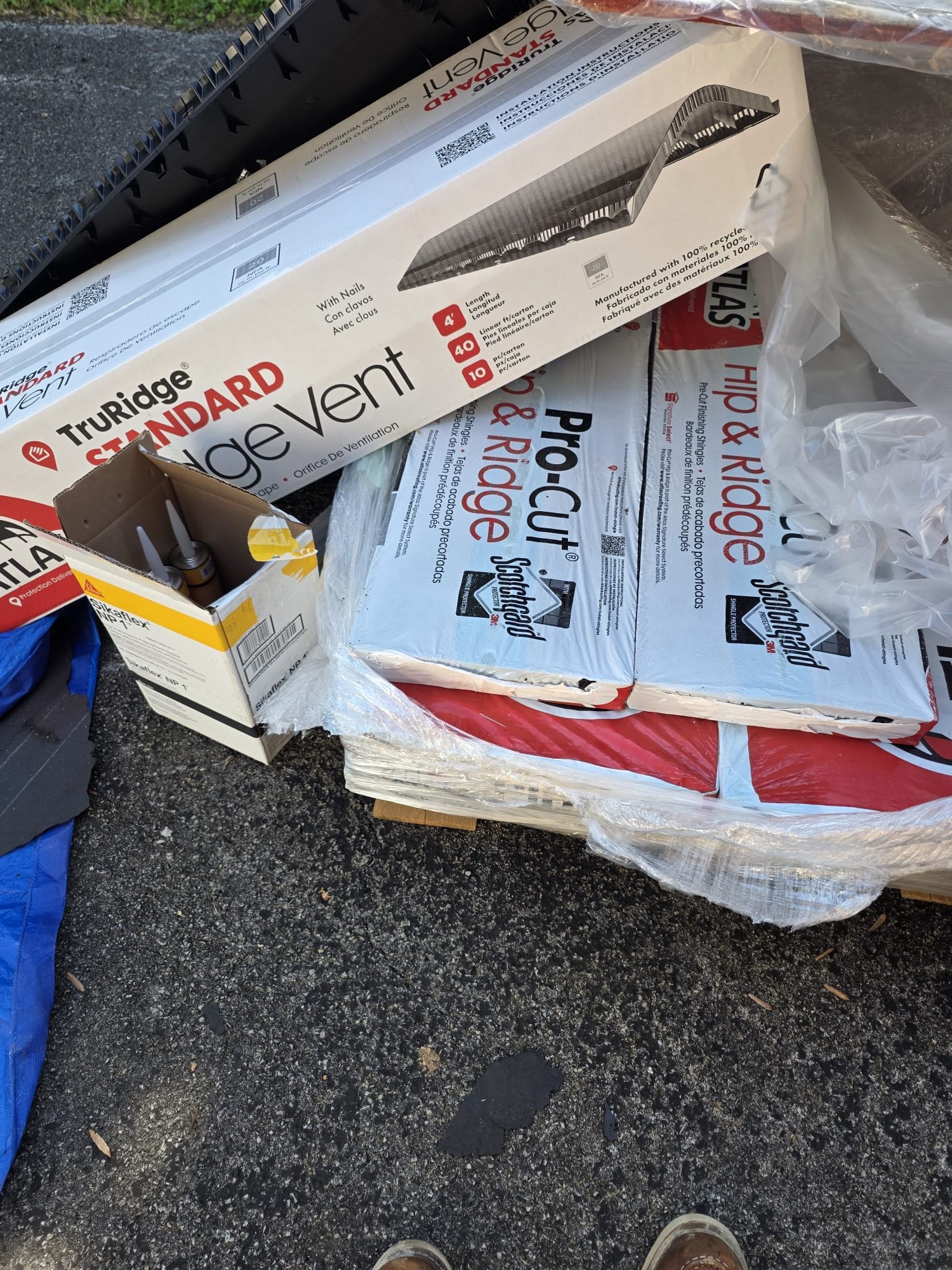 Roofing materials staged for a new roof installation
