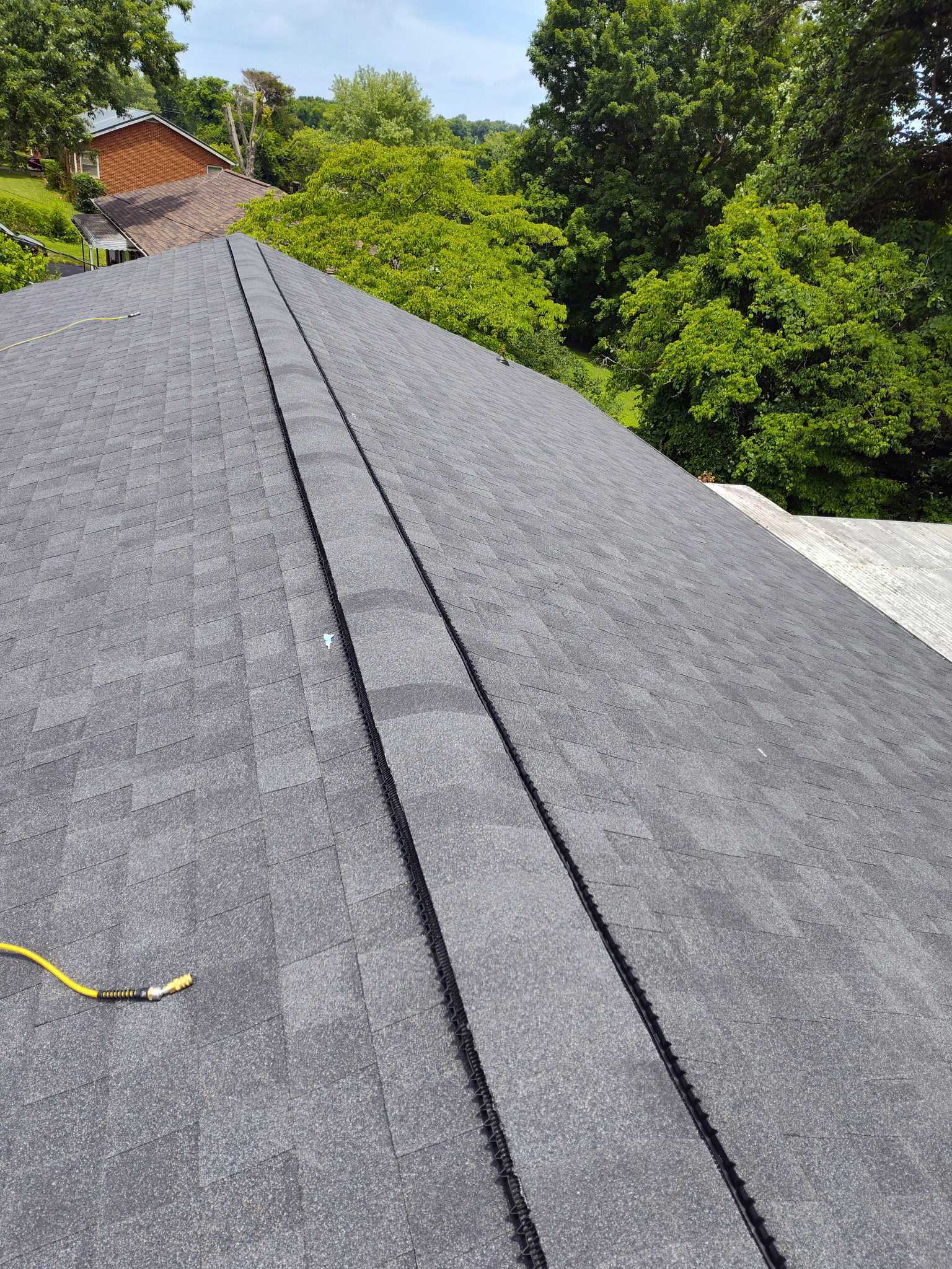 Finished roof with clean shingle lines