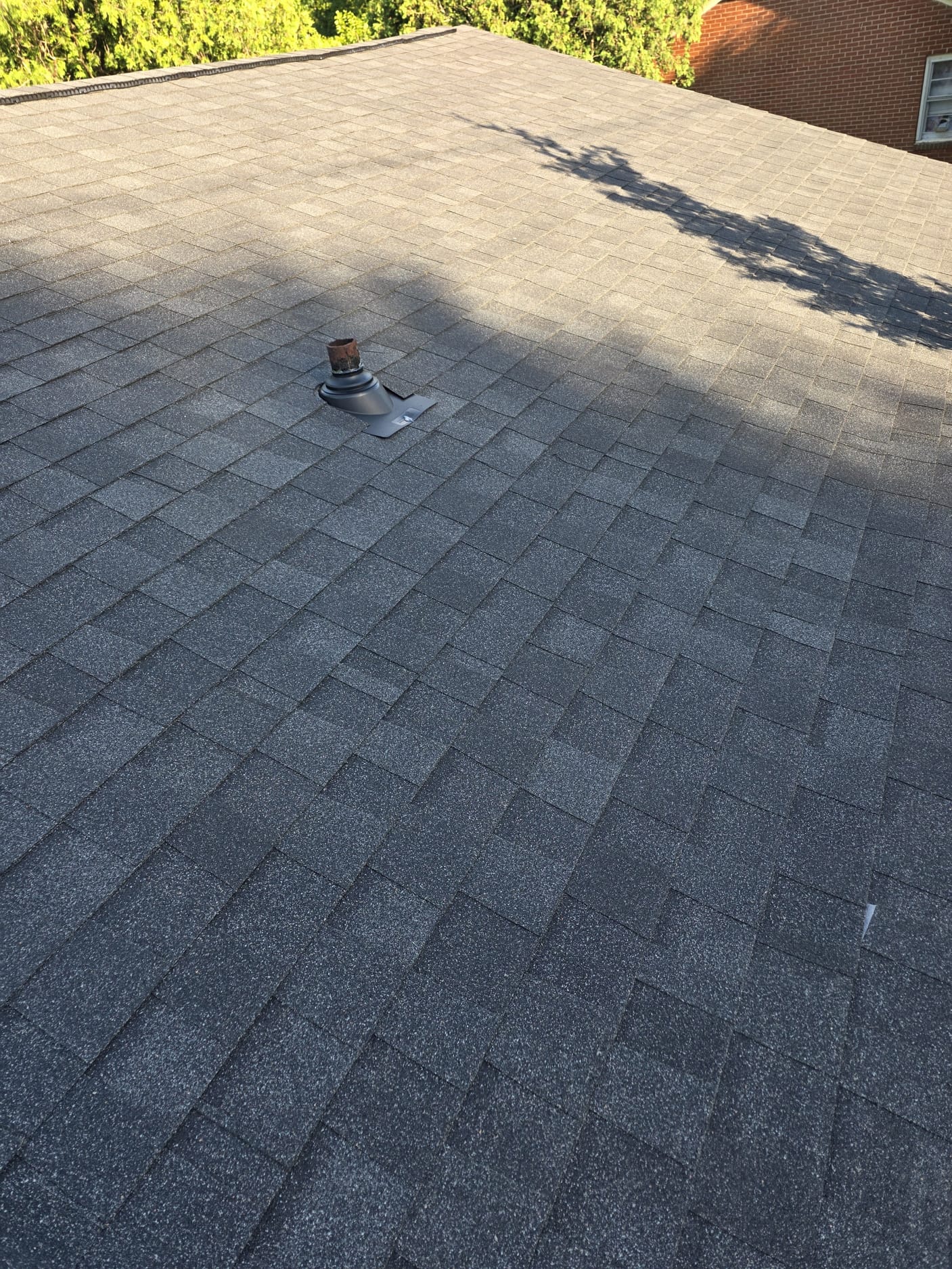 Close-up of a properly sealed roof vent area