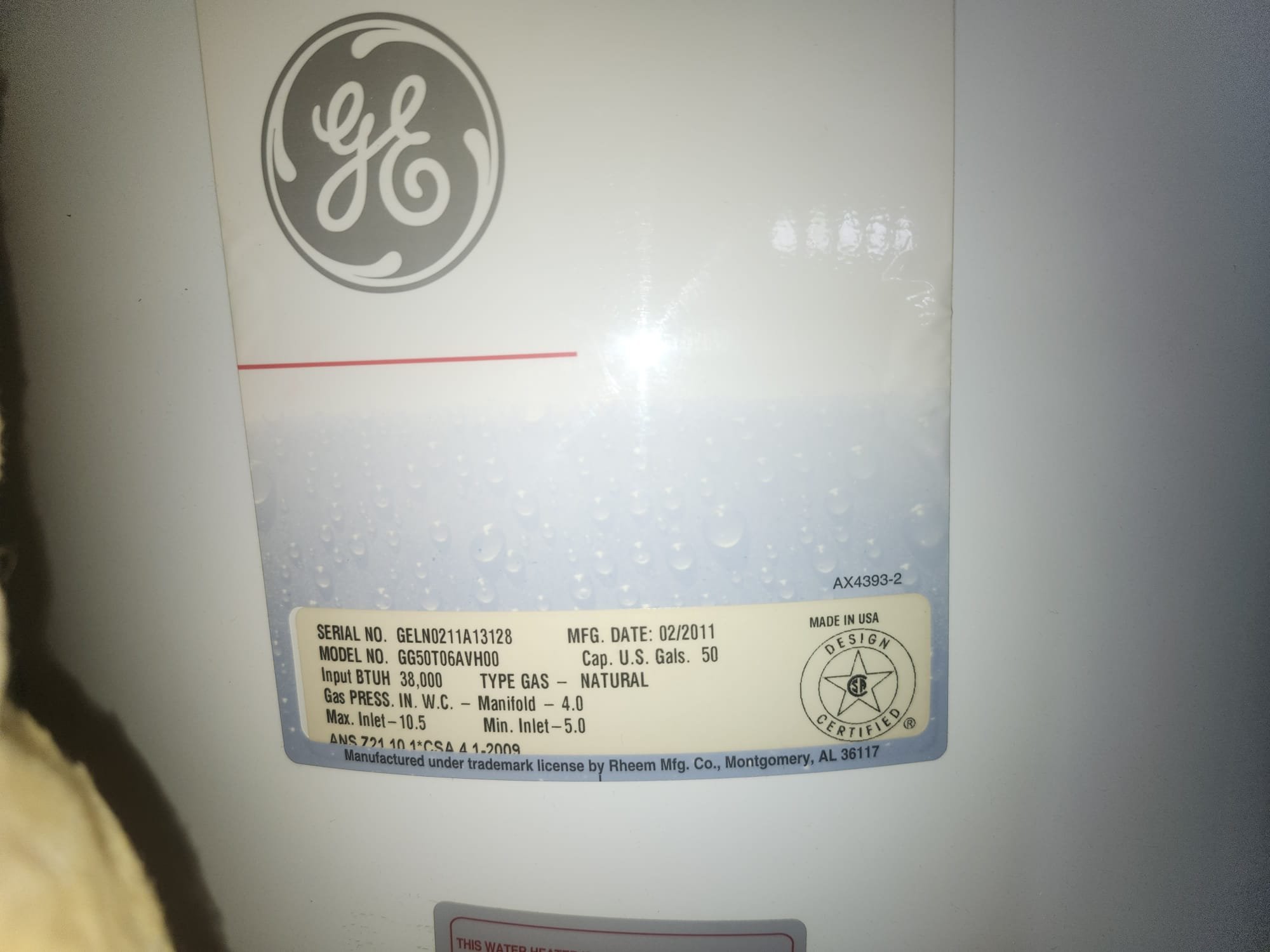 Old water heater label showing an aging tank