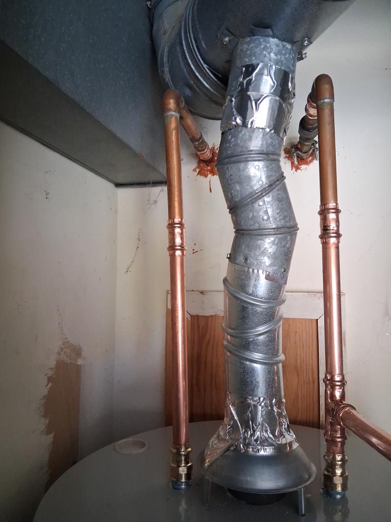 New copper water lines and vent connection at the top of the heater