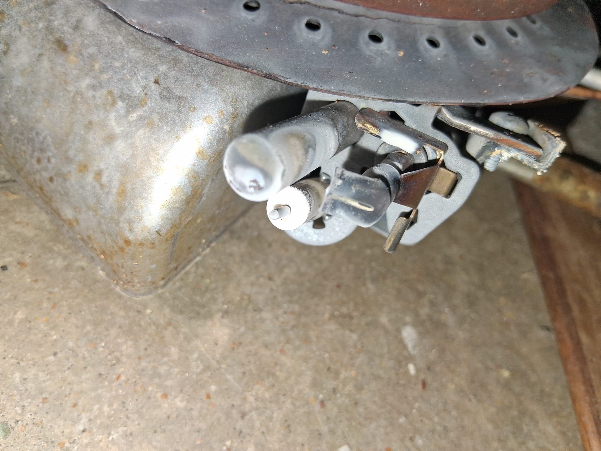 Corroded burner area from an old gas water heater