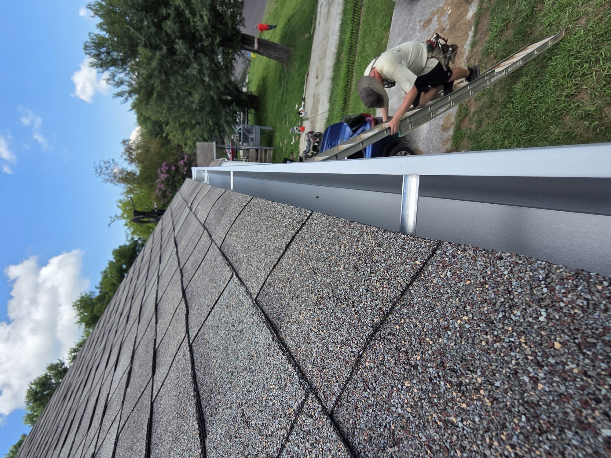 Clean, newly installed gutter along the roofline