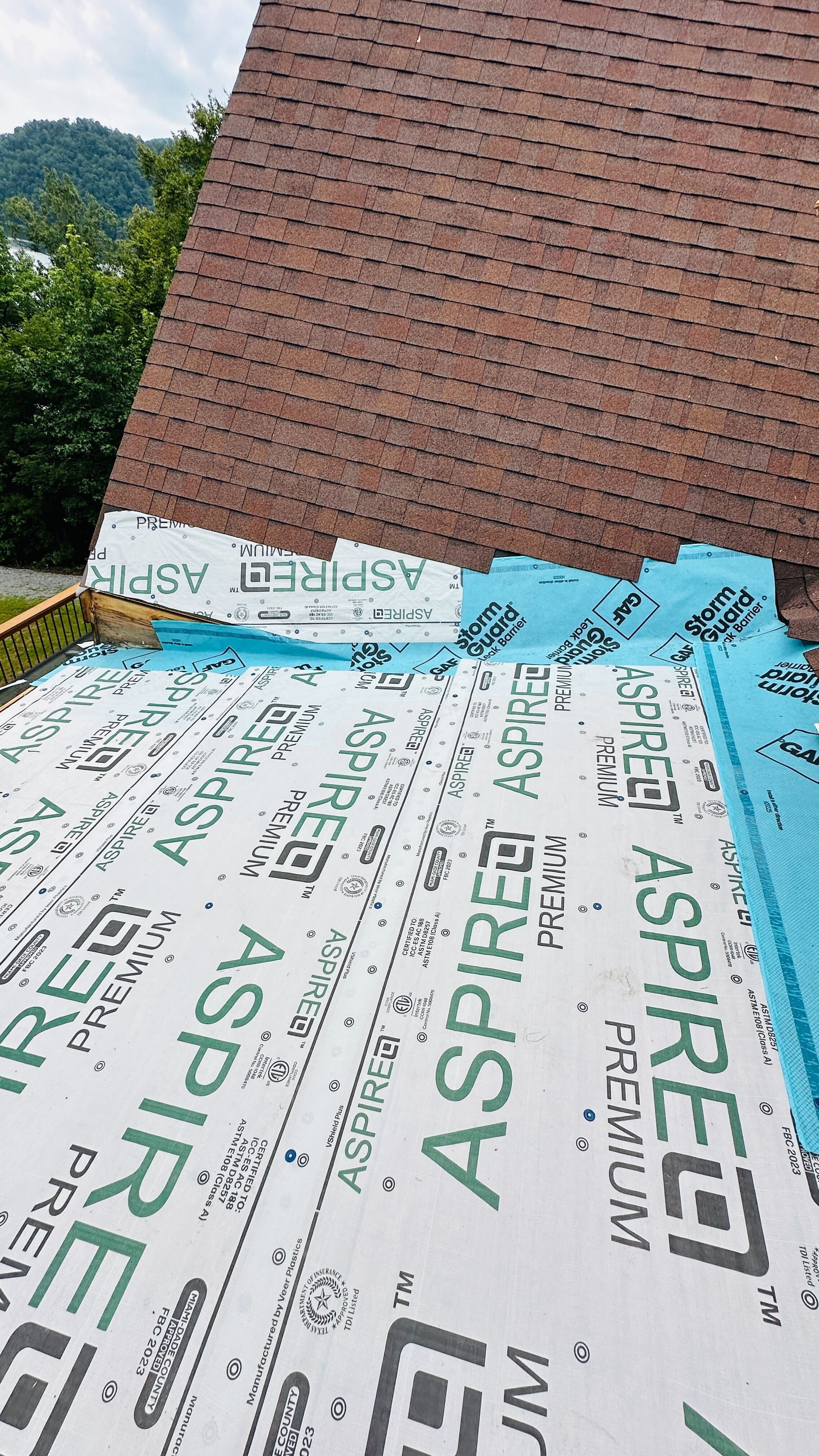 New roofing underlayment installed during a roof replacement