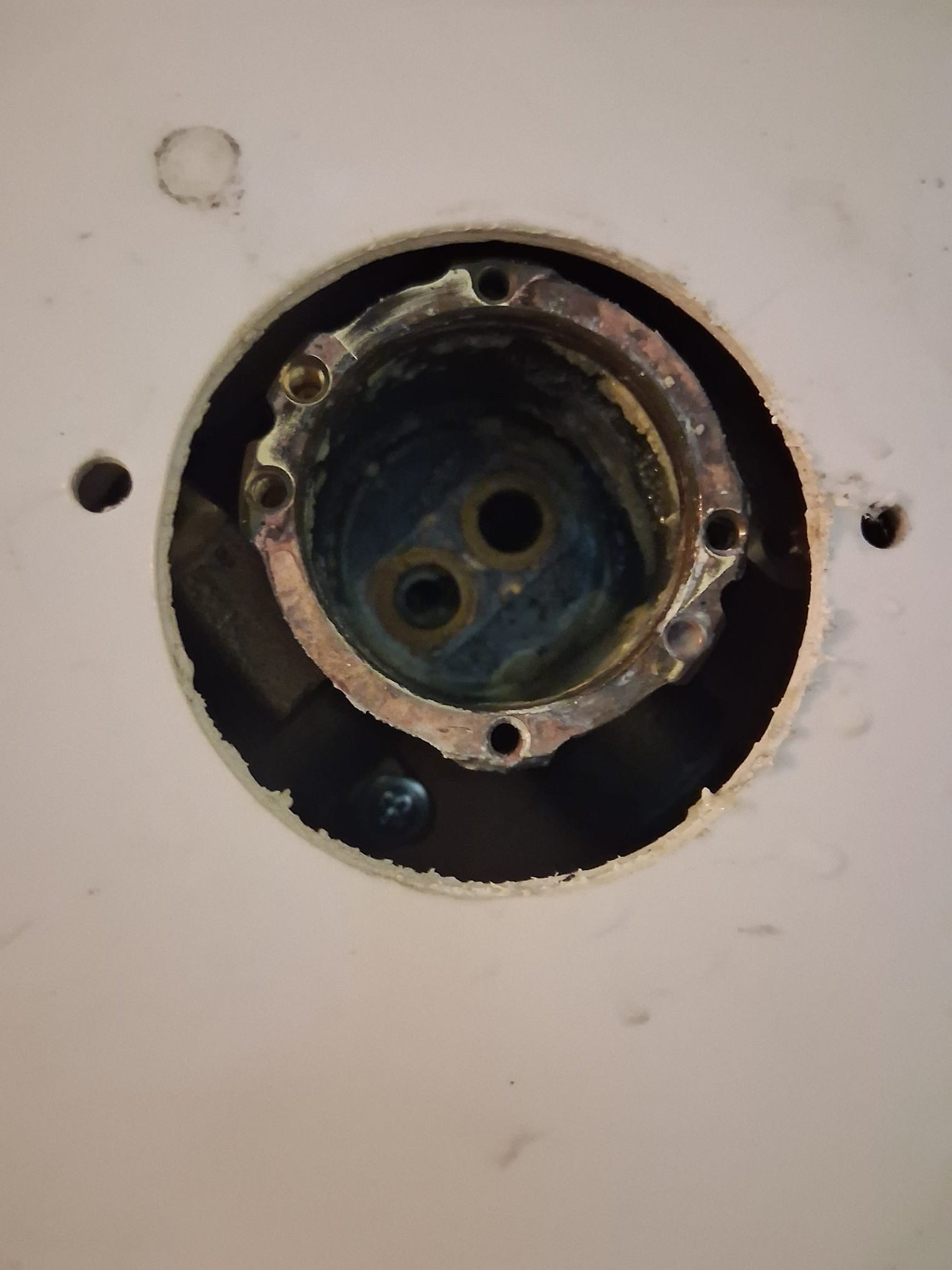 Exposed shower valve during repair work