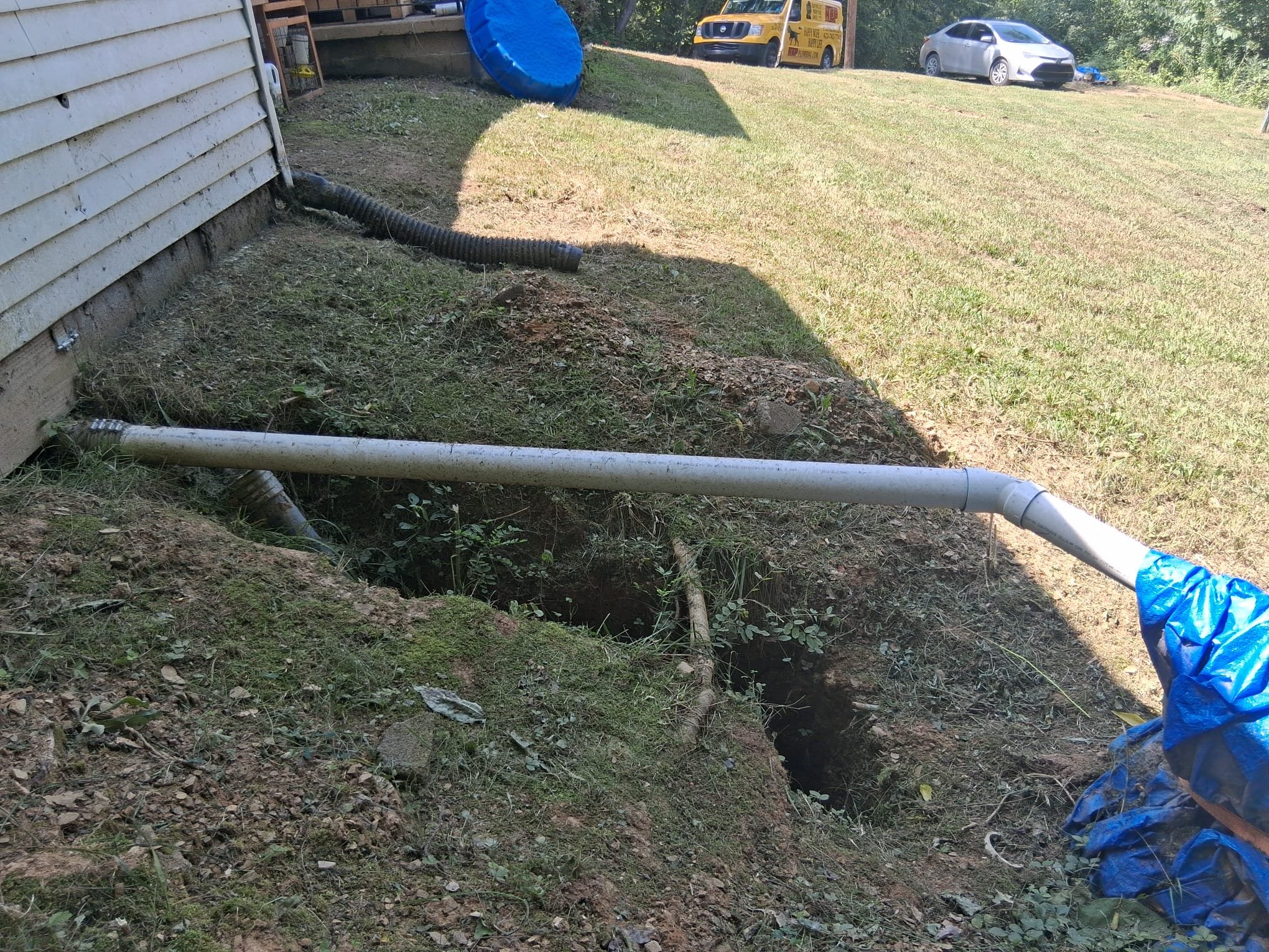 Excavation beside the home during the replacement
