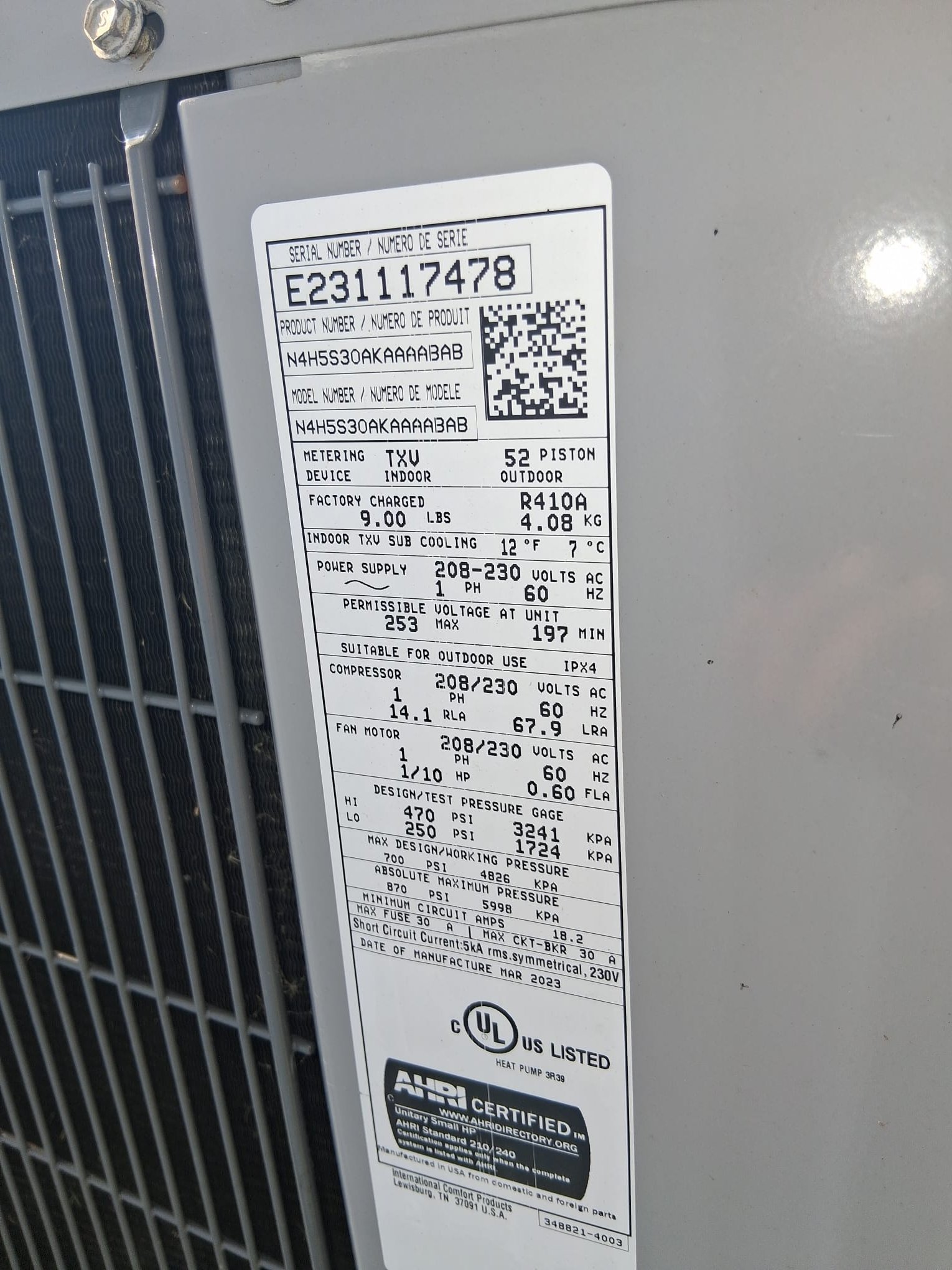 Equipment labels on a newer outdoor unit help with future service and identification.