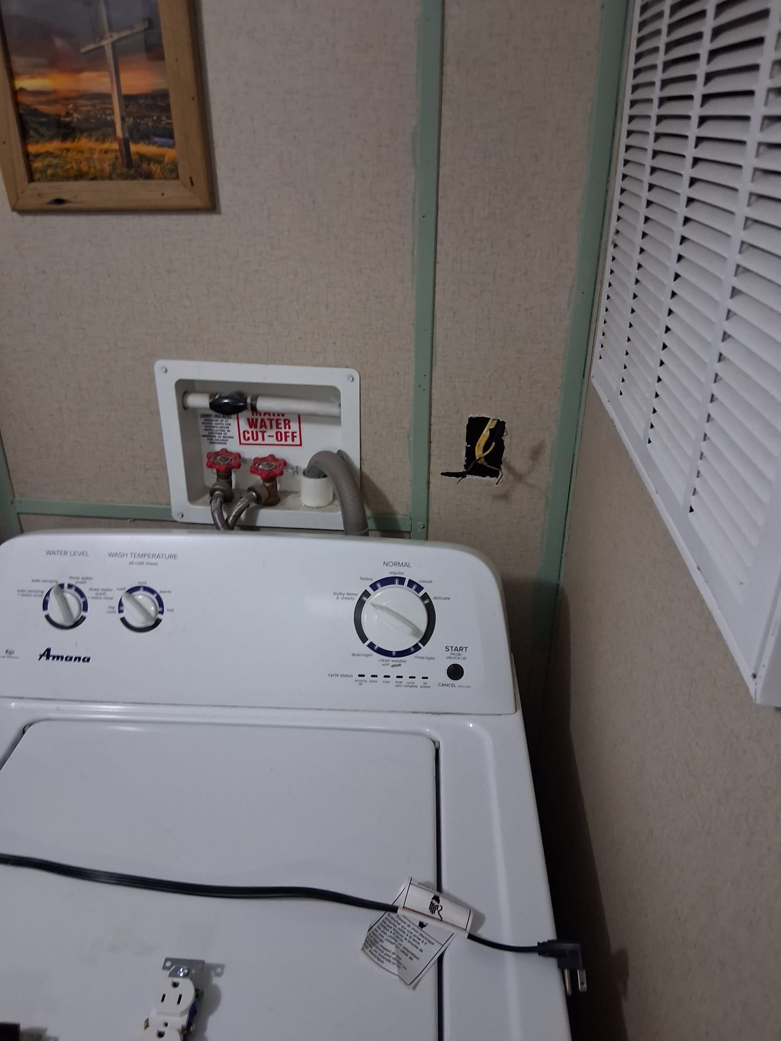 Loose wiring and unfinished outlet opening during repair