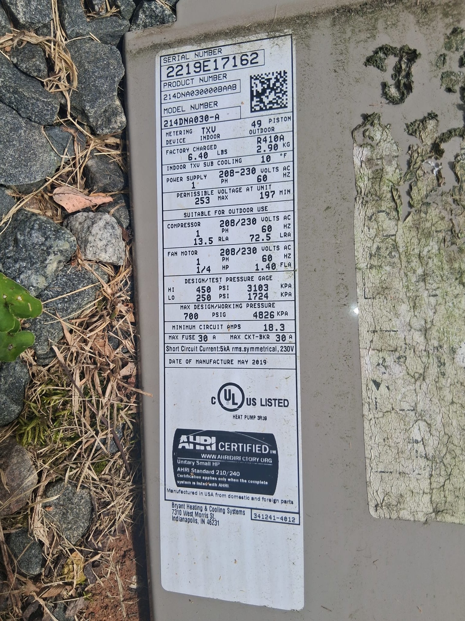 HVAC equipment label showing model and service information