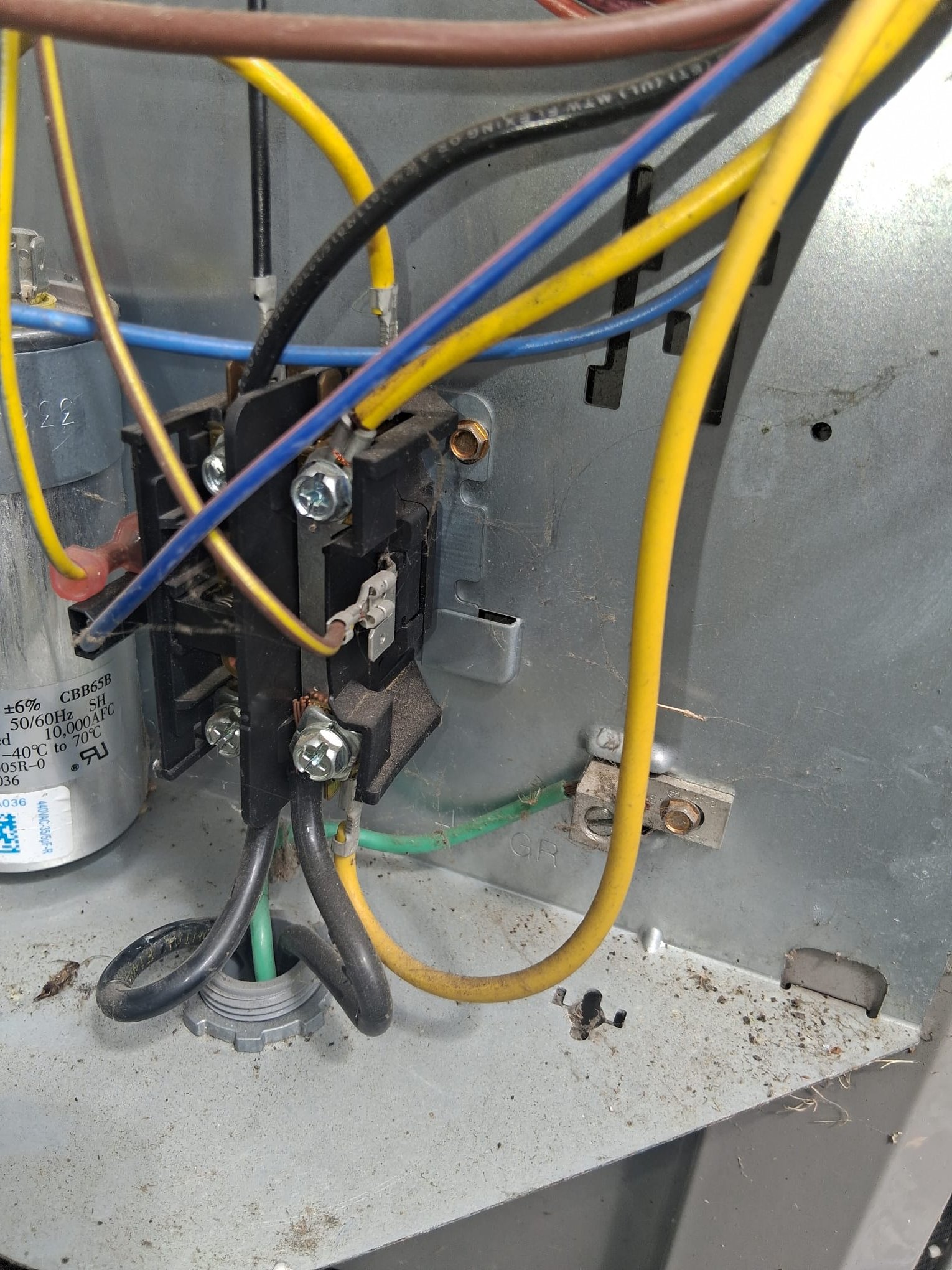 Open HVAC electrical compartment showing internal components during service