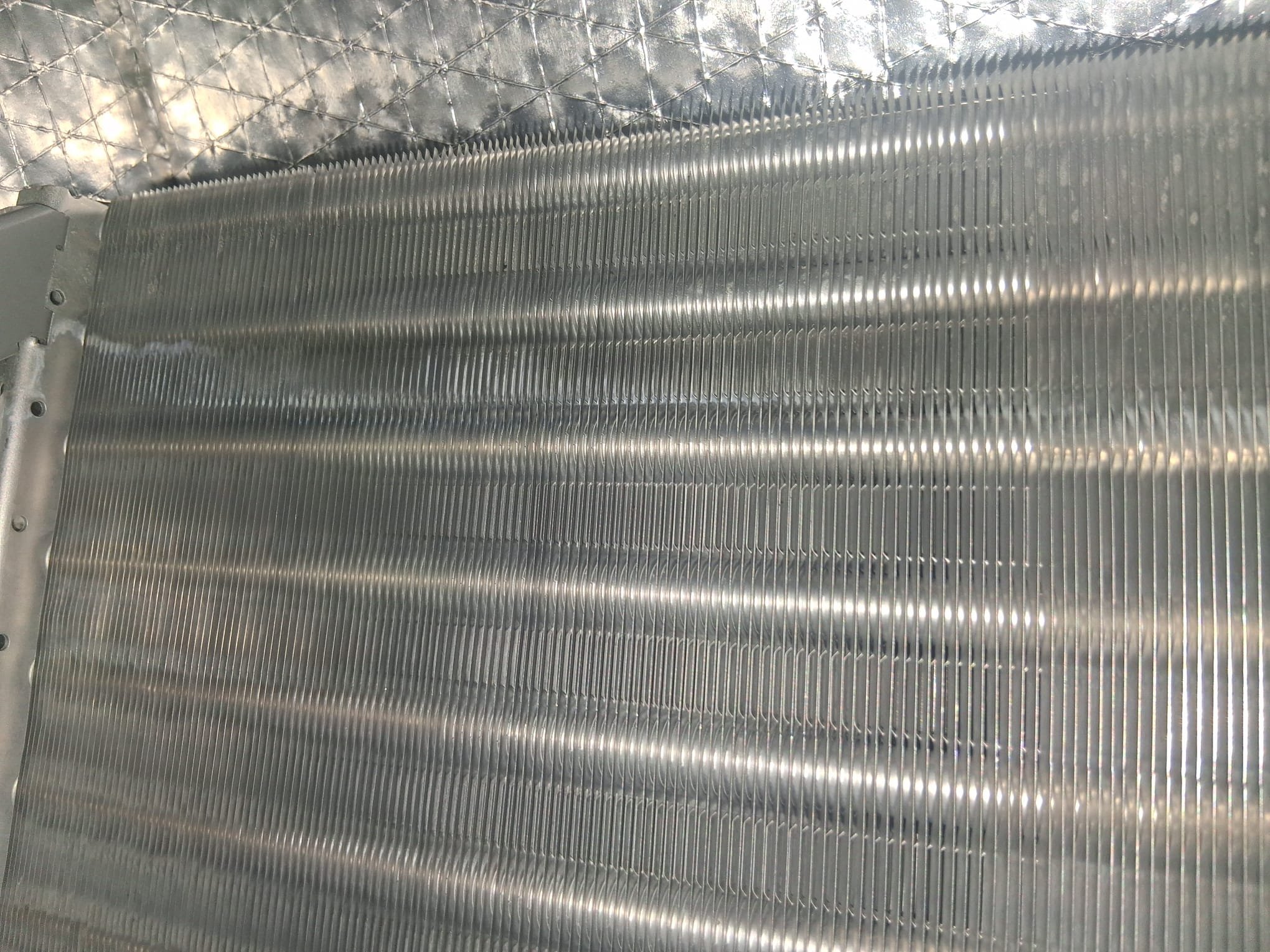 A clean HVAC coil, showing the kind of condition that helps airflow stay strong
