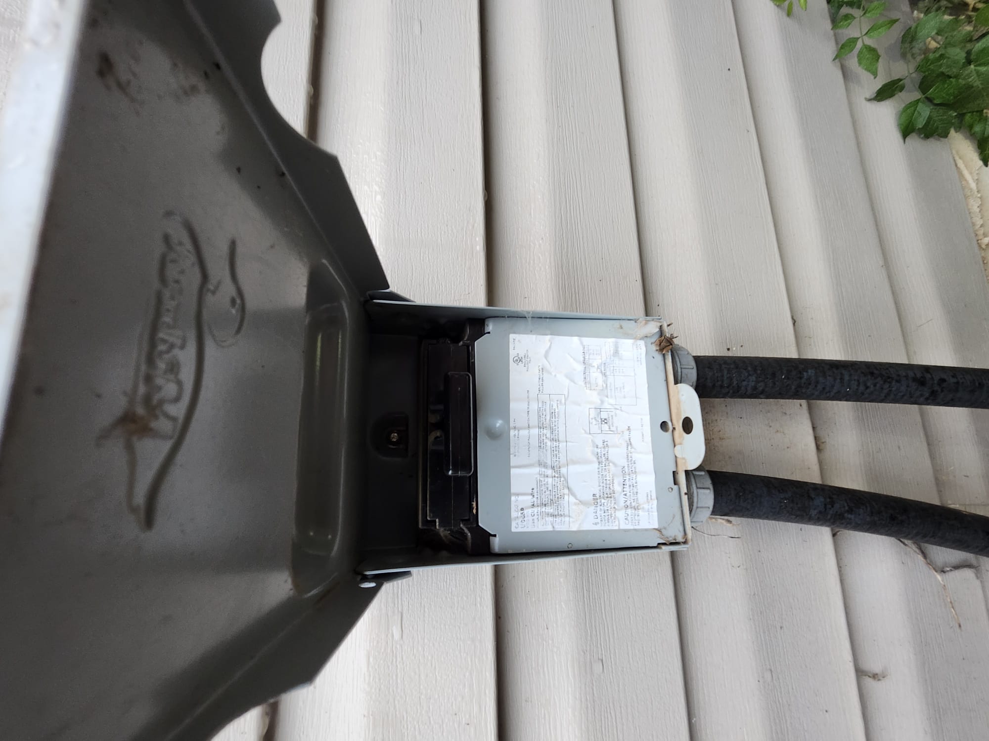 Outdoor HVAC disconnect box open during service