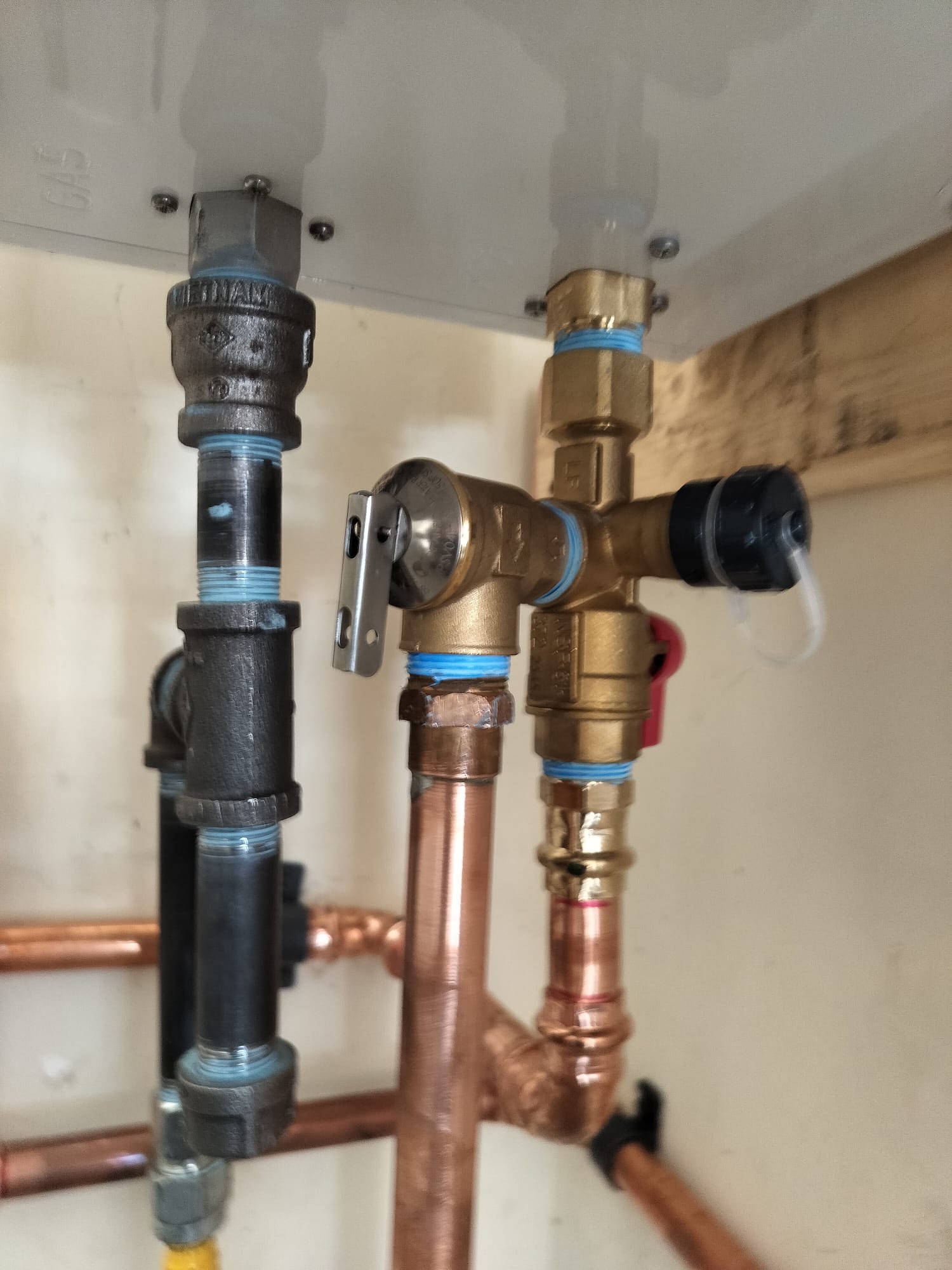 Freshly installed valves and copper piping