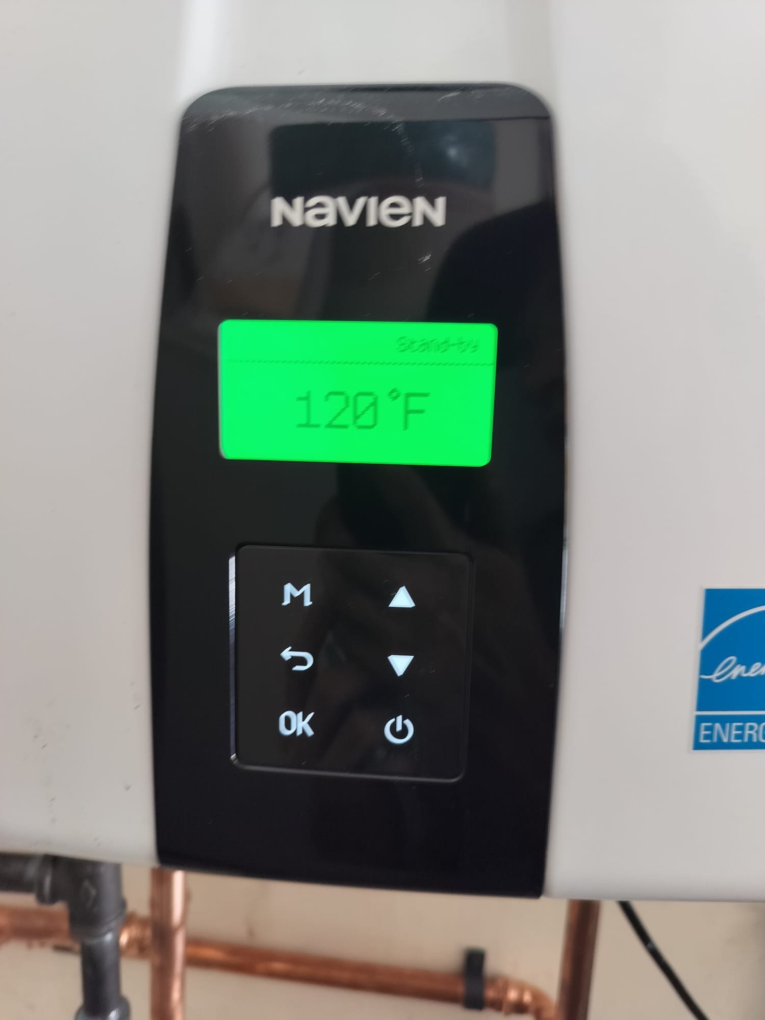 Tankless water heater display showing normal operation